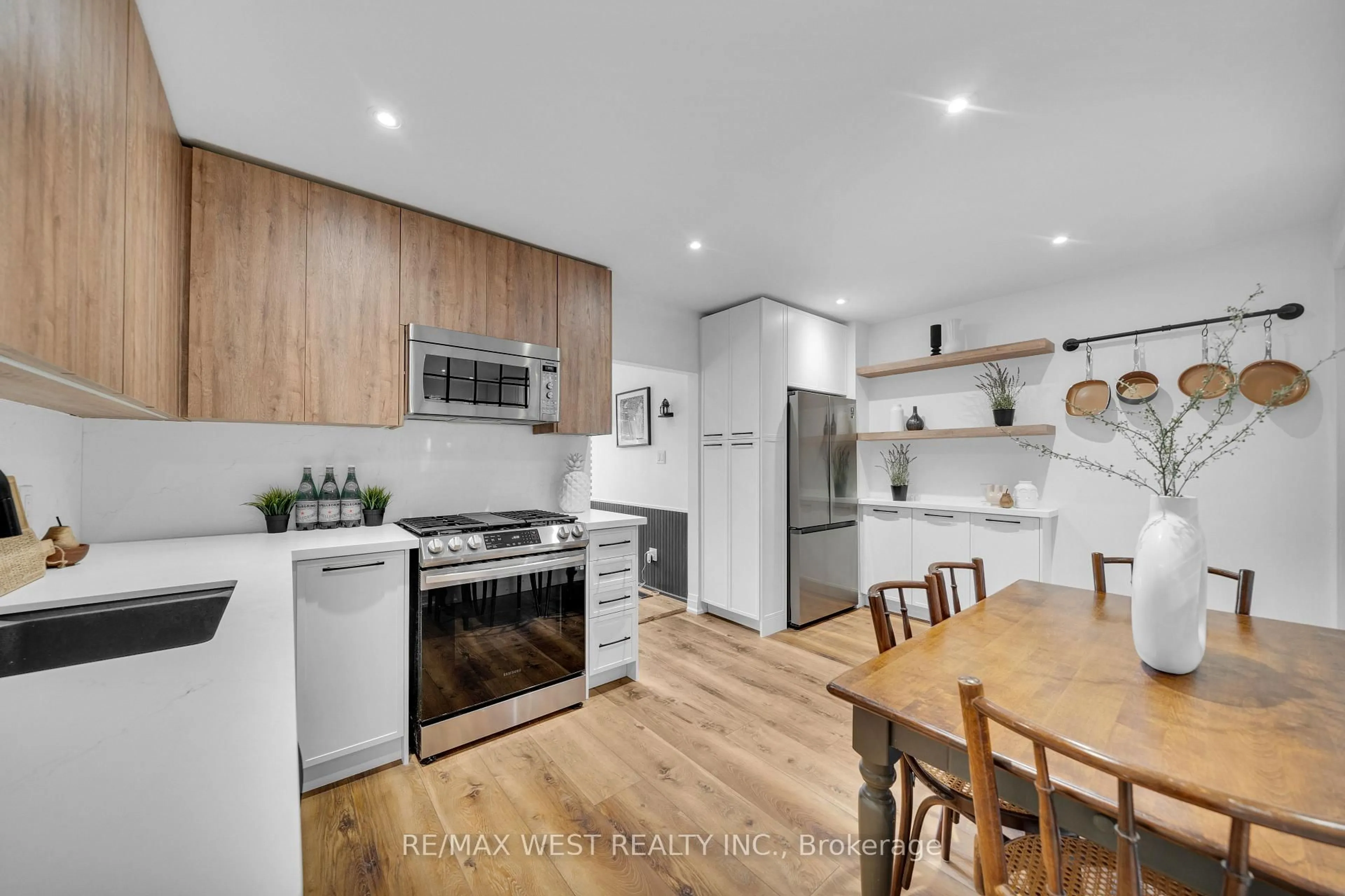 Open concept kitchen, wood/laminate floor for 259 Sixth St, Toronto Ontario M8V 3A8