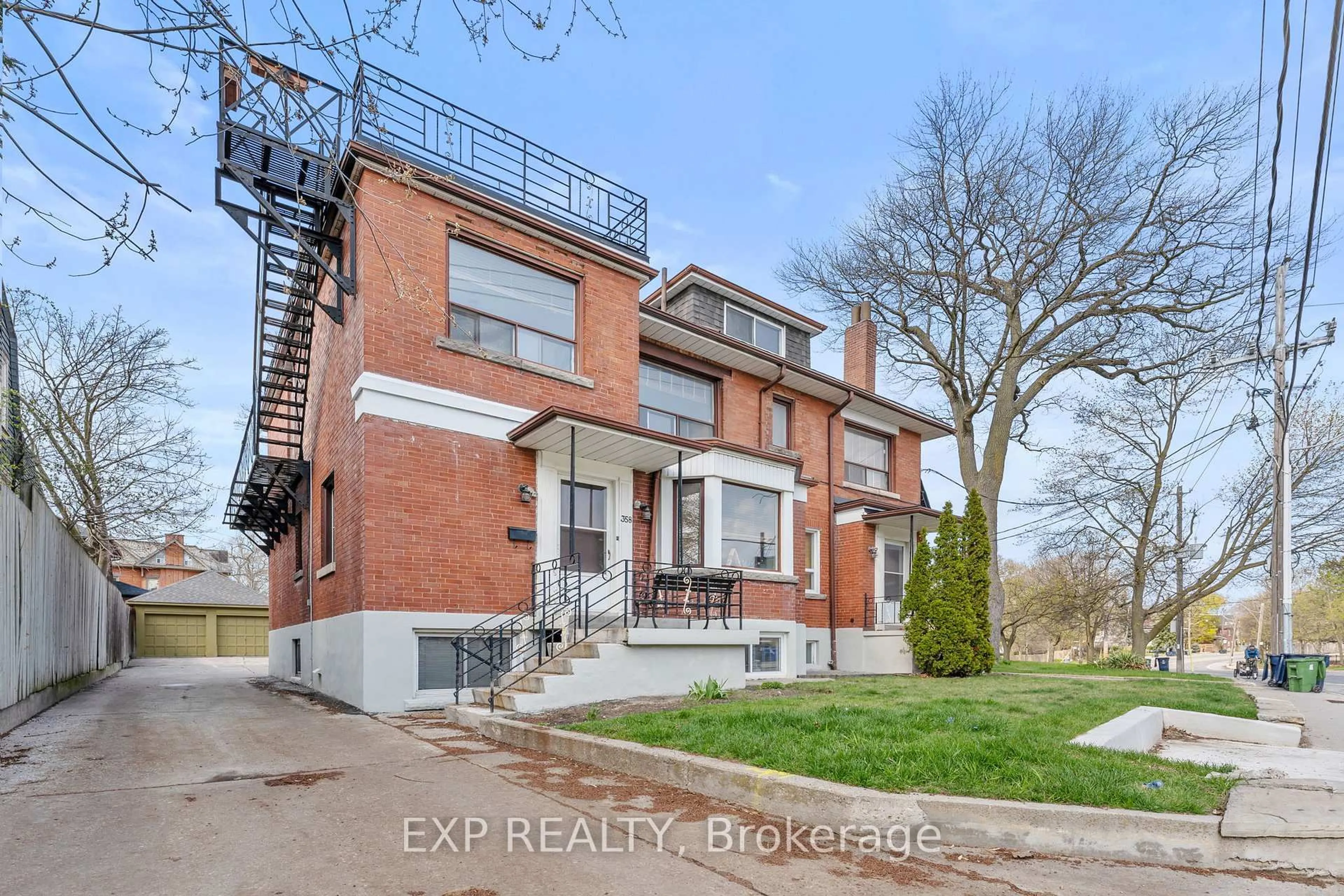 Home with brick exterior material, building for 354 Annette St, Toronto Ontario M6P 1R5