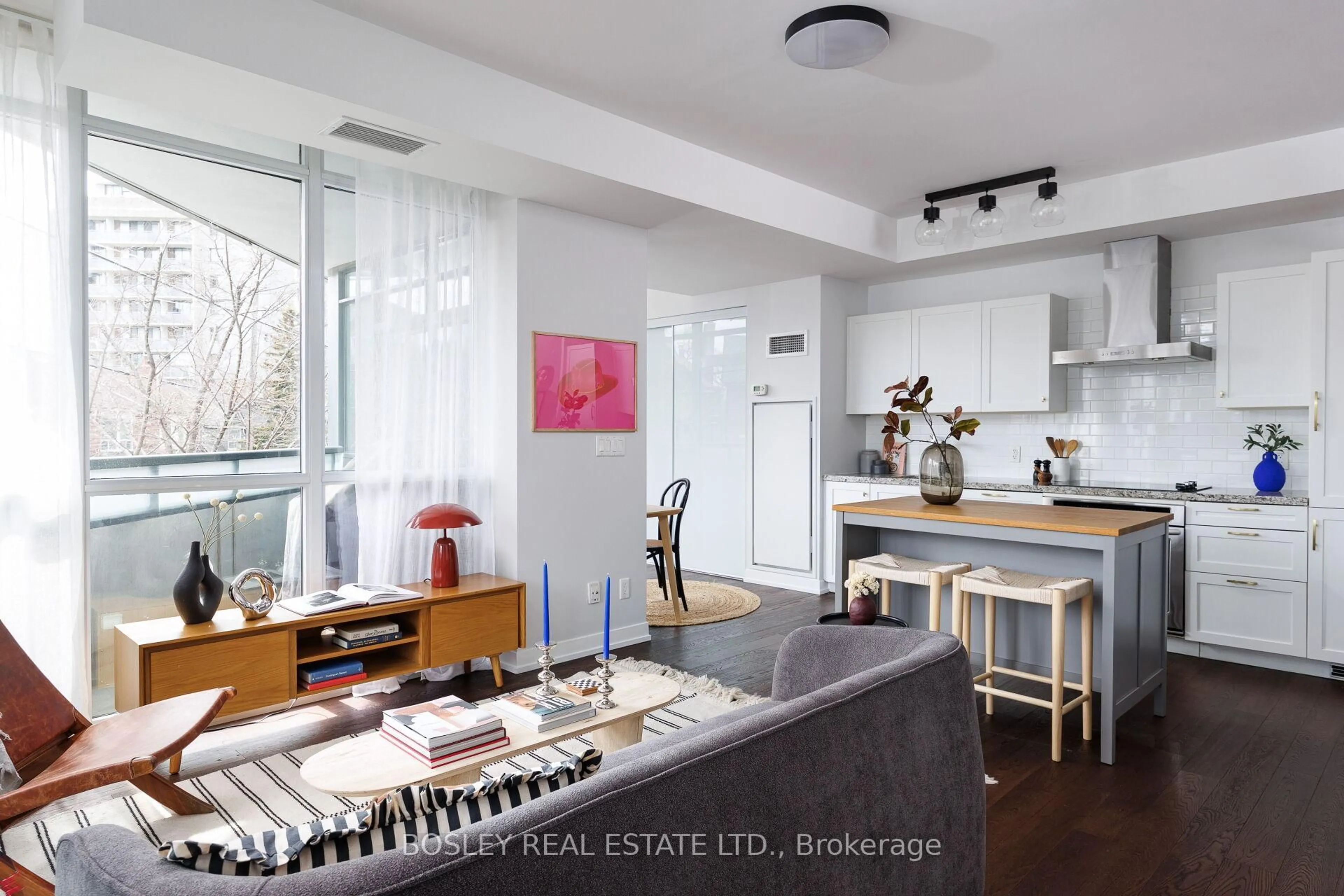 Open concept kitchen, wood/laminate floor for 36 Howard Park Ave #209, Toronto Ontario M6R 0A5