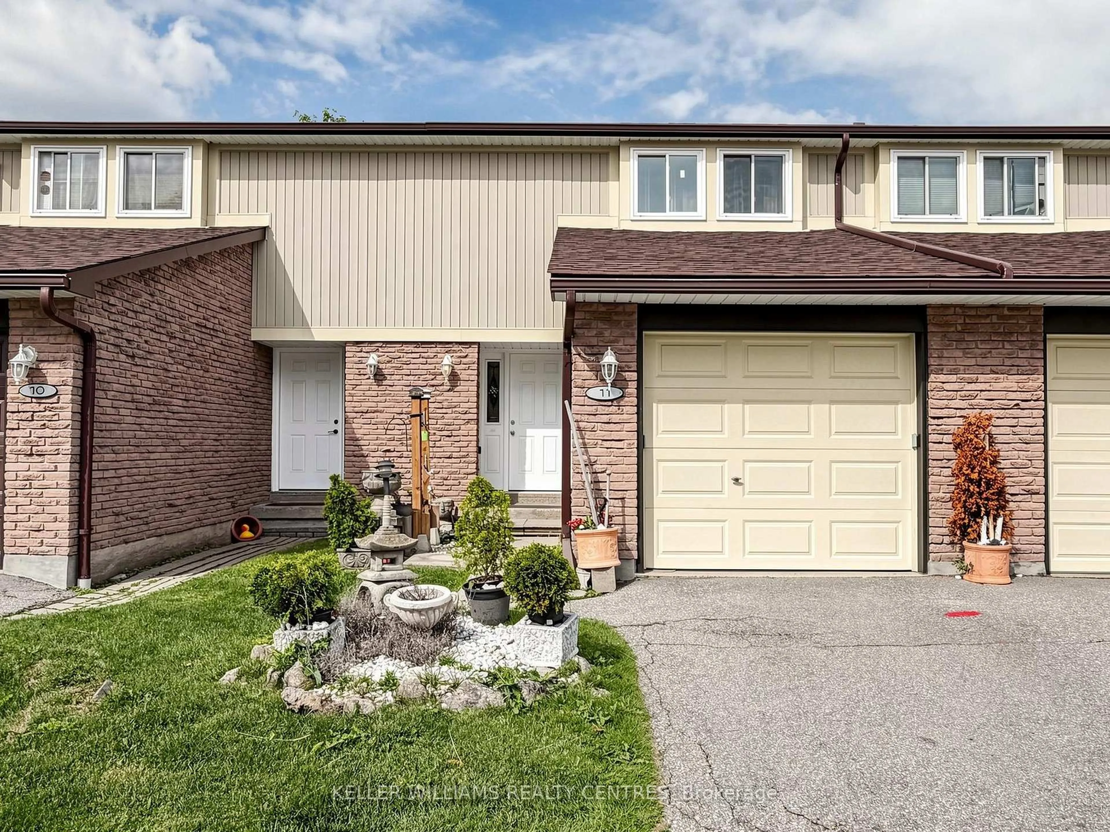 Home with brick exterior material, street for 341 Wilson Dr #11, Milton Ontario L9T 3Y9