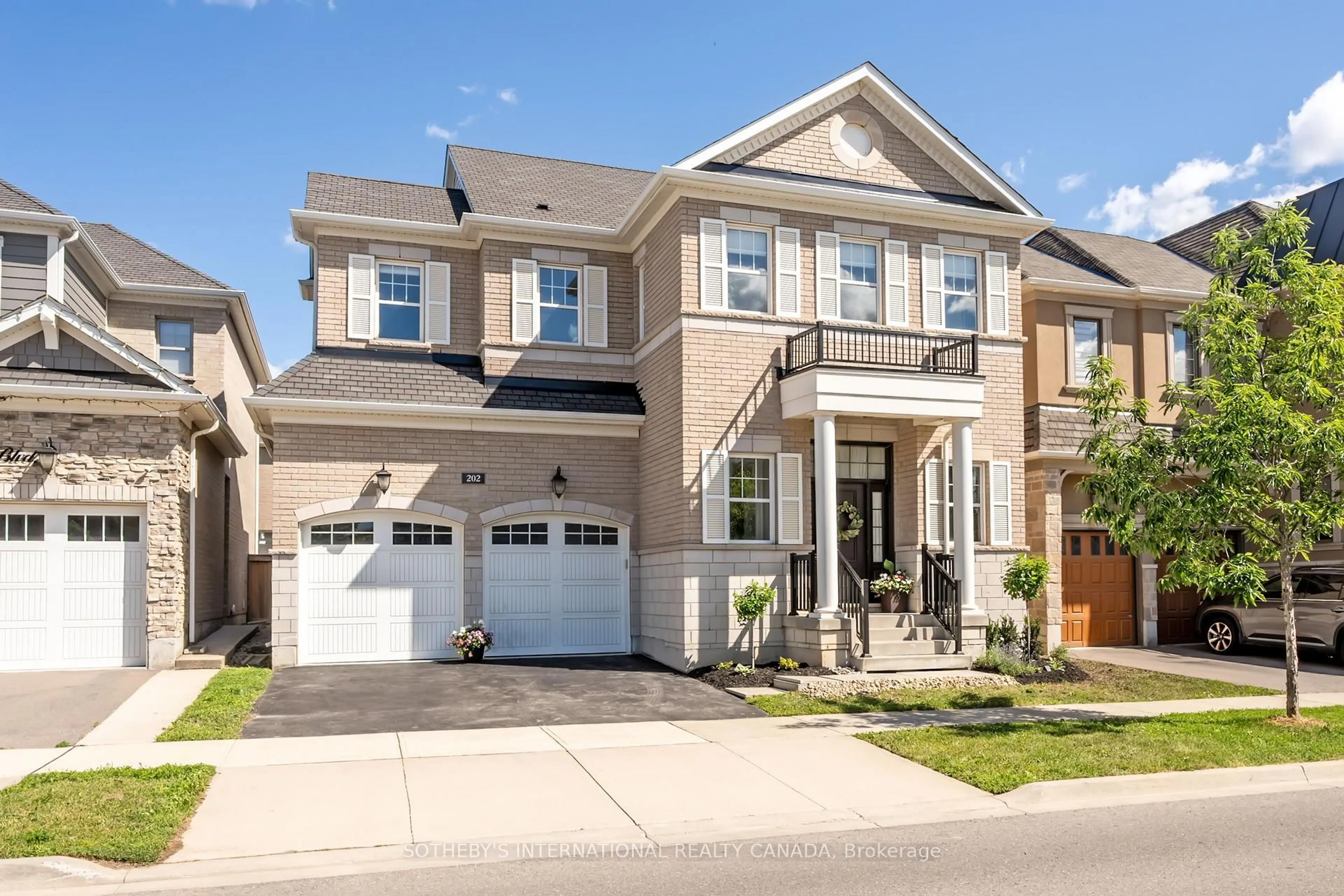 Home with brick exterior material, street for 202 North Park Blvd, Oakville Ontario L6M 0Z9