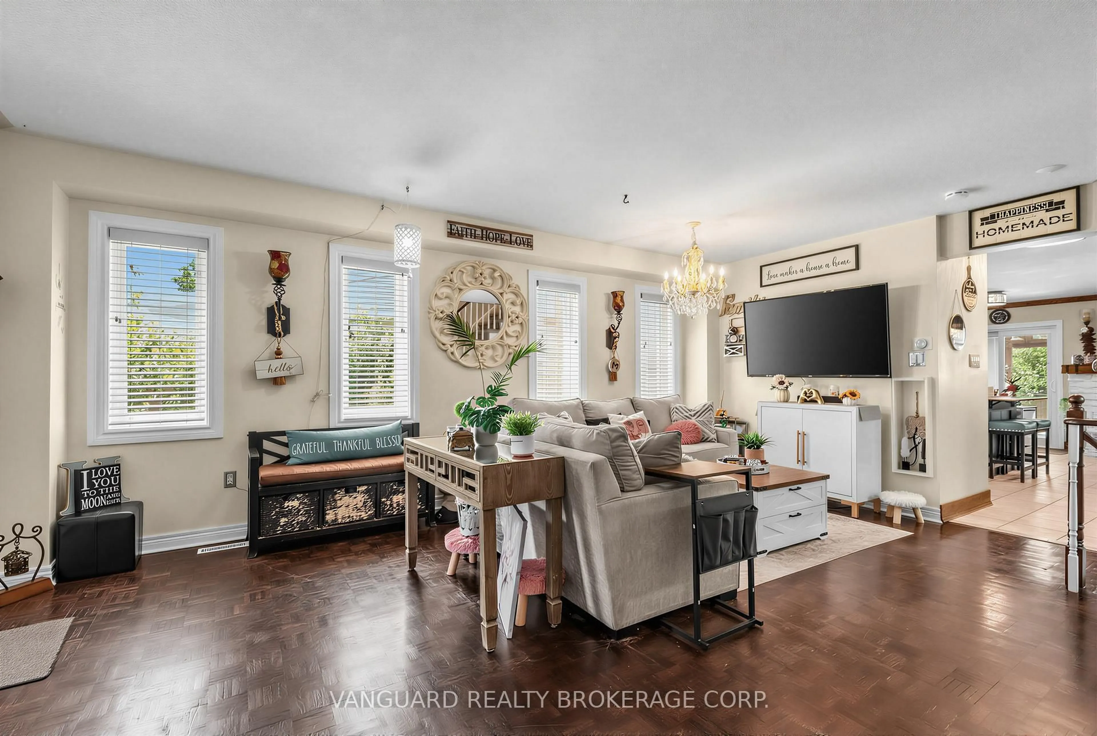 Living room with furniture, wood/laminate floor for 111 Grapevine Rd, Caledon Ontario L7E 2M6