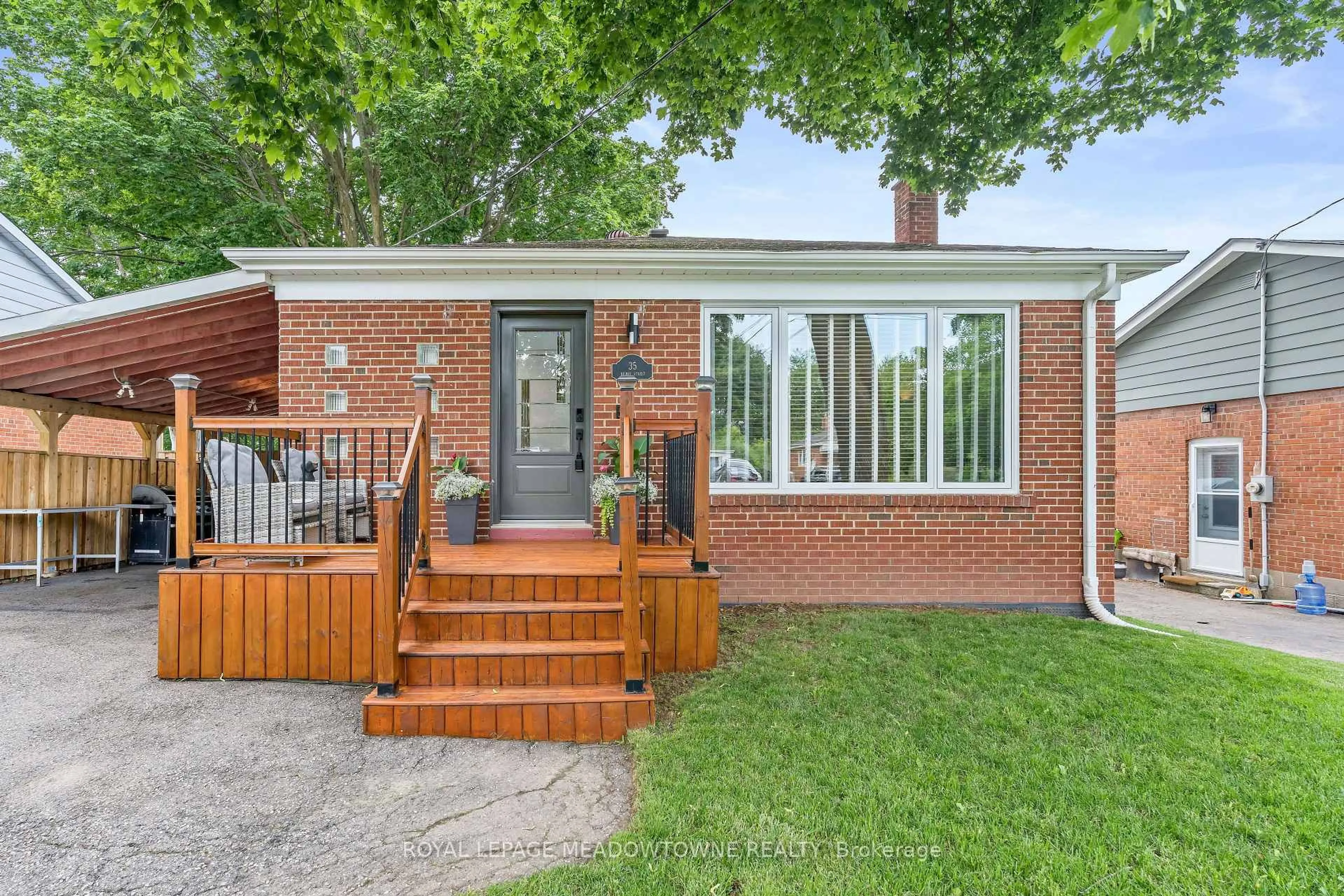 Home with brick exterior material, street for 35 Henry St, Halton Hills Ontario L7G 2K5