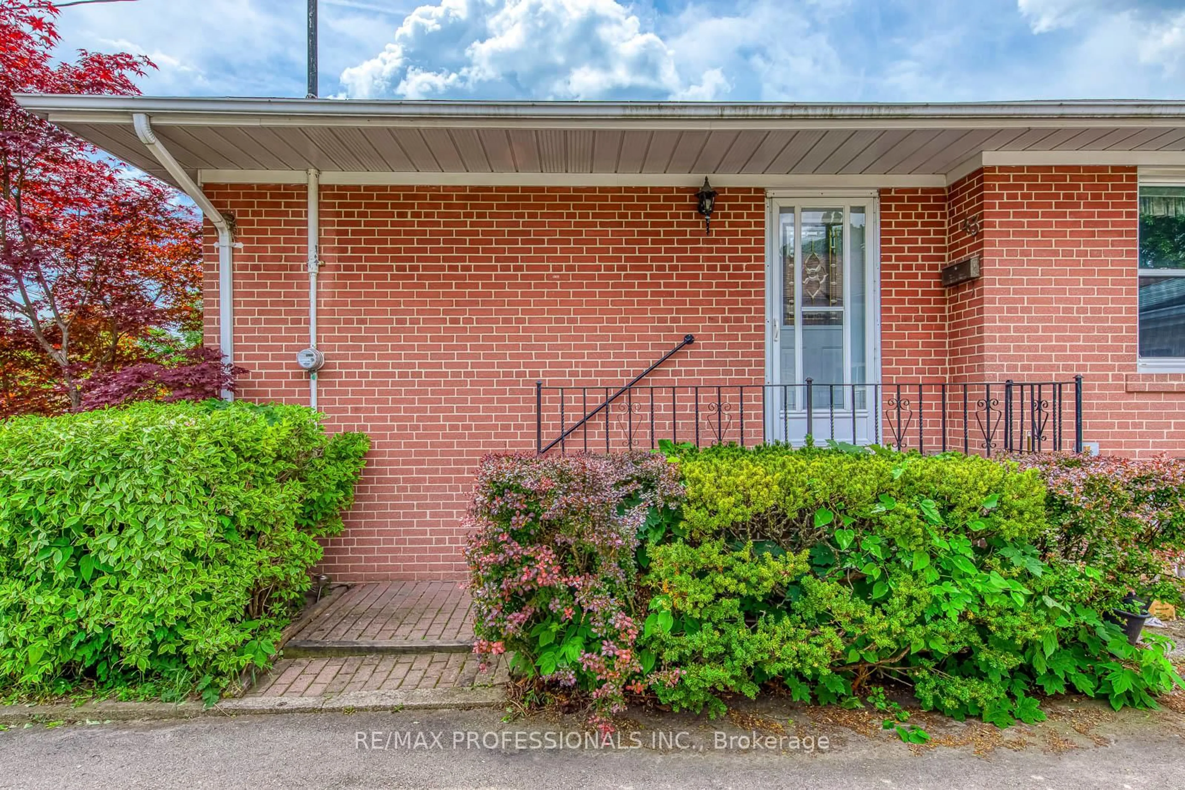 Home with brick exterior material, street for 43 Belgate Pl, Toronto Ontario M9C 3Y5