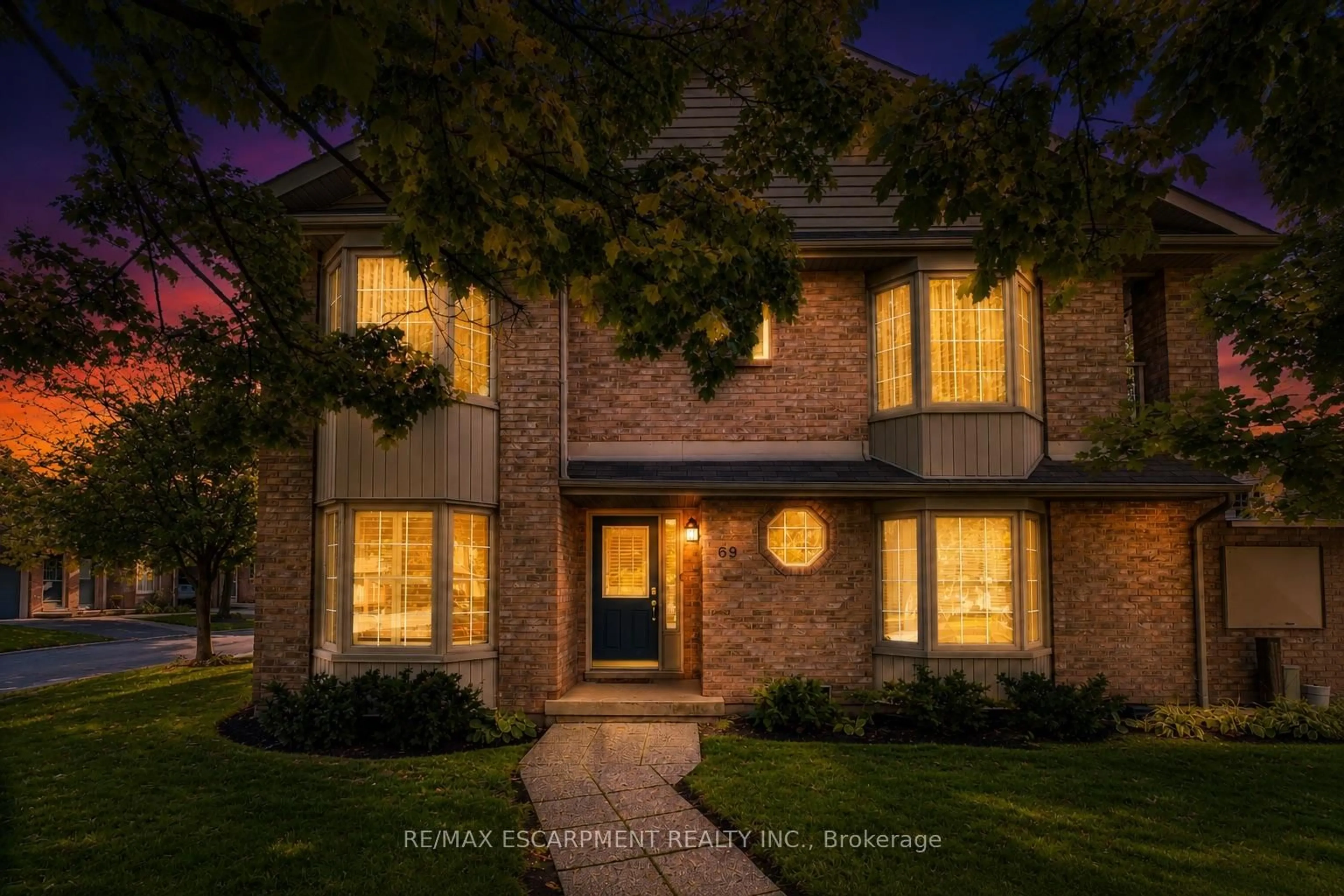 Home with brick exterior material, street for 3333 New St #69, Burlington Ontario L7N 1N1