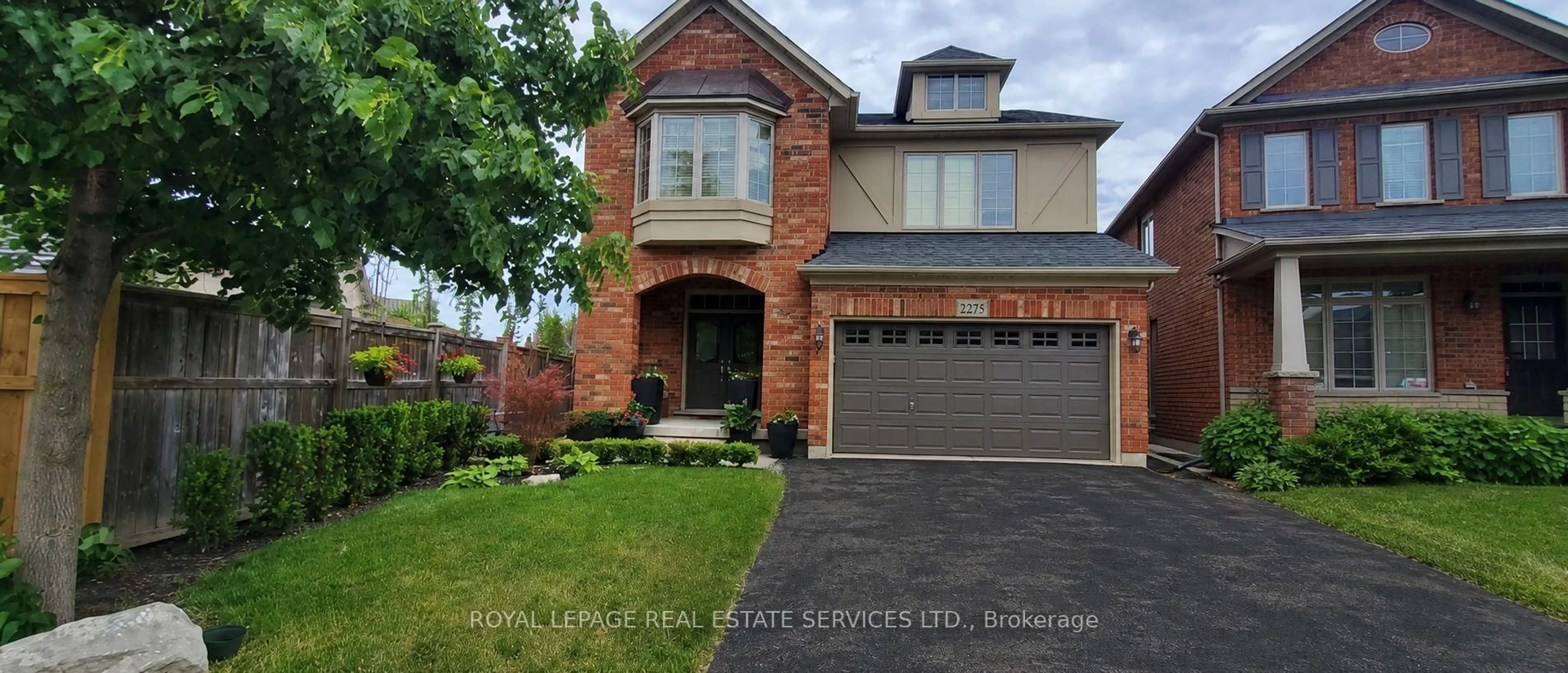 Home with brick exterior material, street for 2275 Littondale Lane, Oakville Ontario L6M 0A6