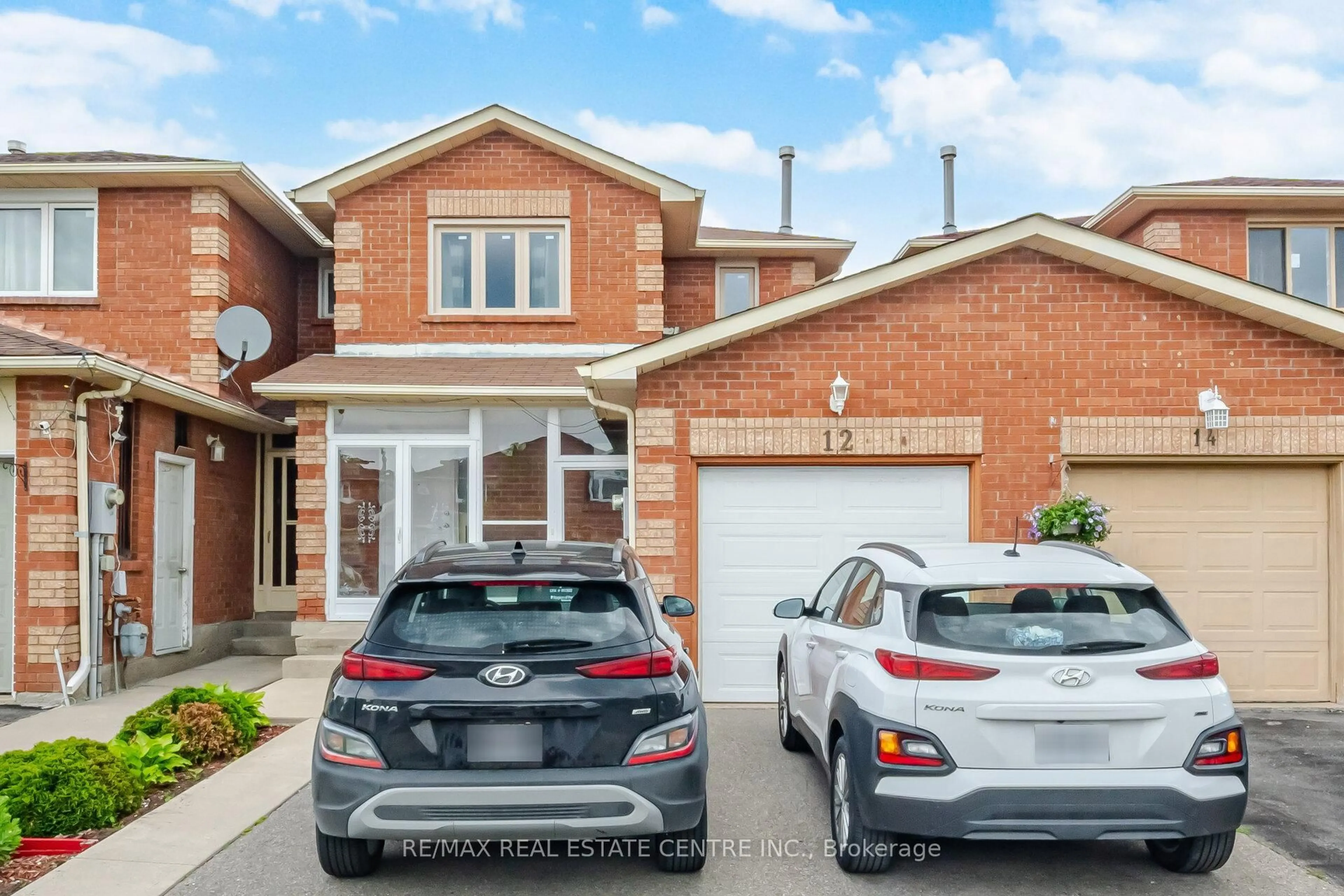Home with brick exterior material, street for 12 Woodsend Ru, Brampton Ontario L6Y 4G8