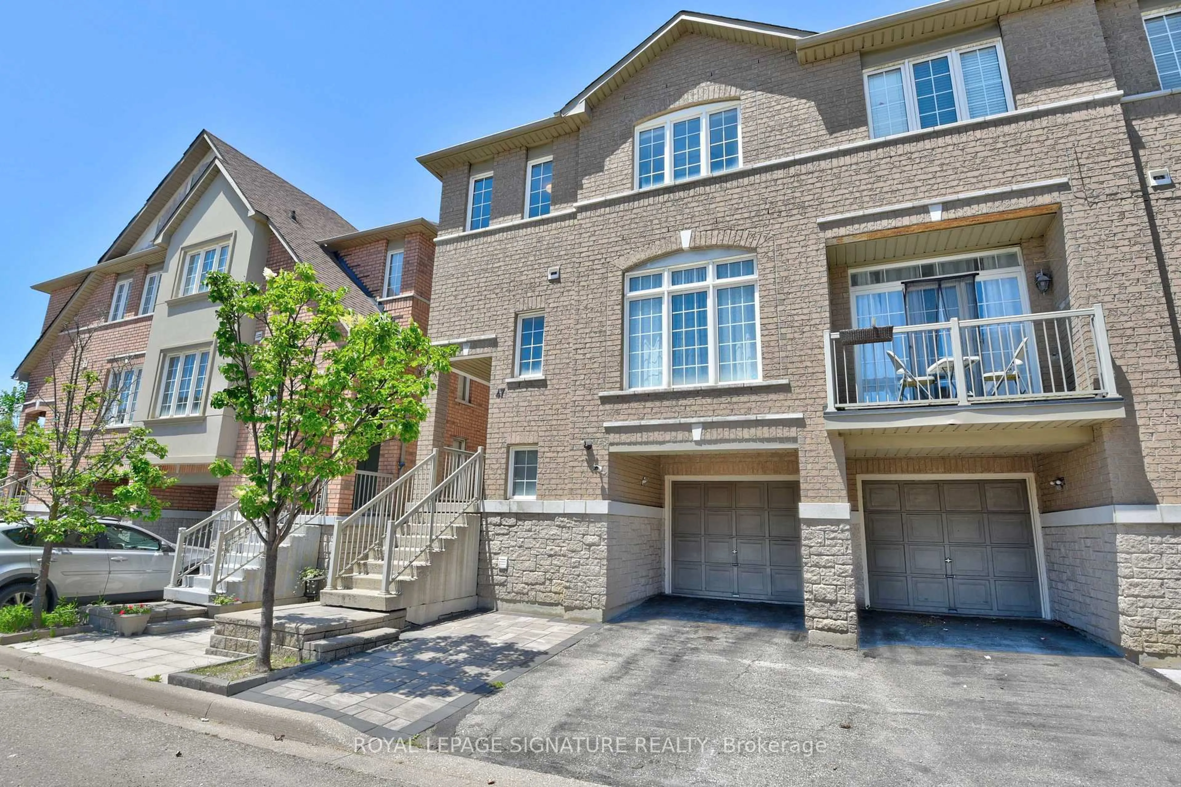 Home with brick exterior material, street for 7155 Magistrate Terr #47, Mississauga Ontario L5W 1Y8