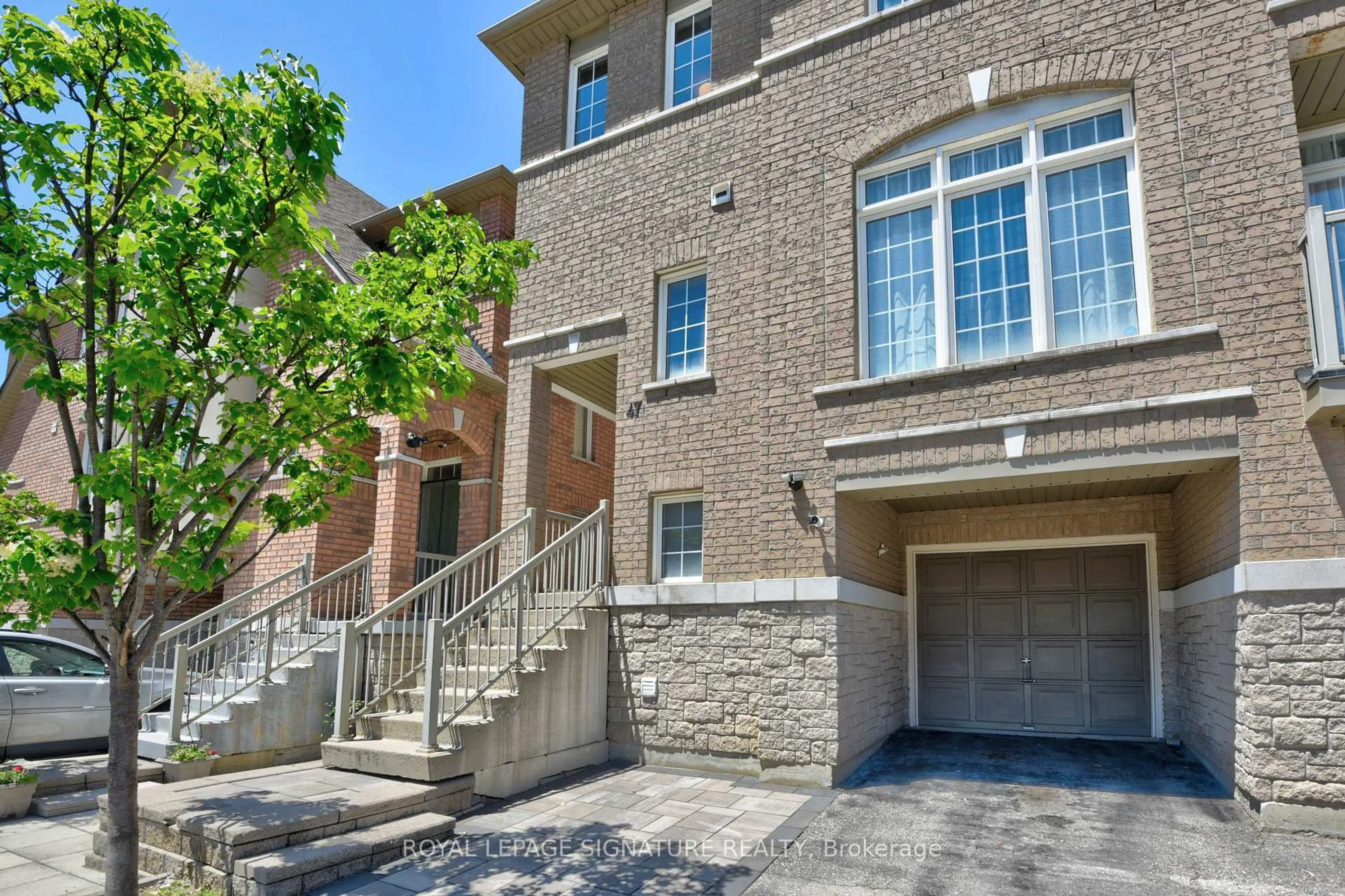 Home with brick exterior material, street for 7155 Magistrate Terr #47, Mississauga Ontario L5W 1Y8