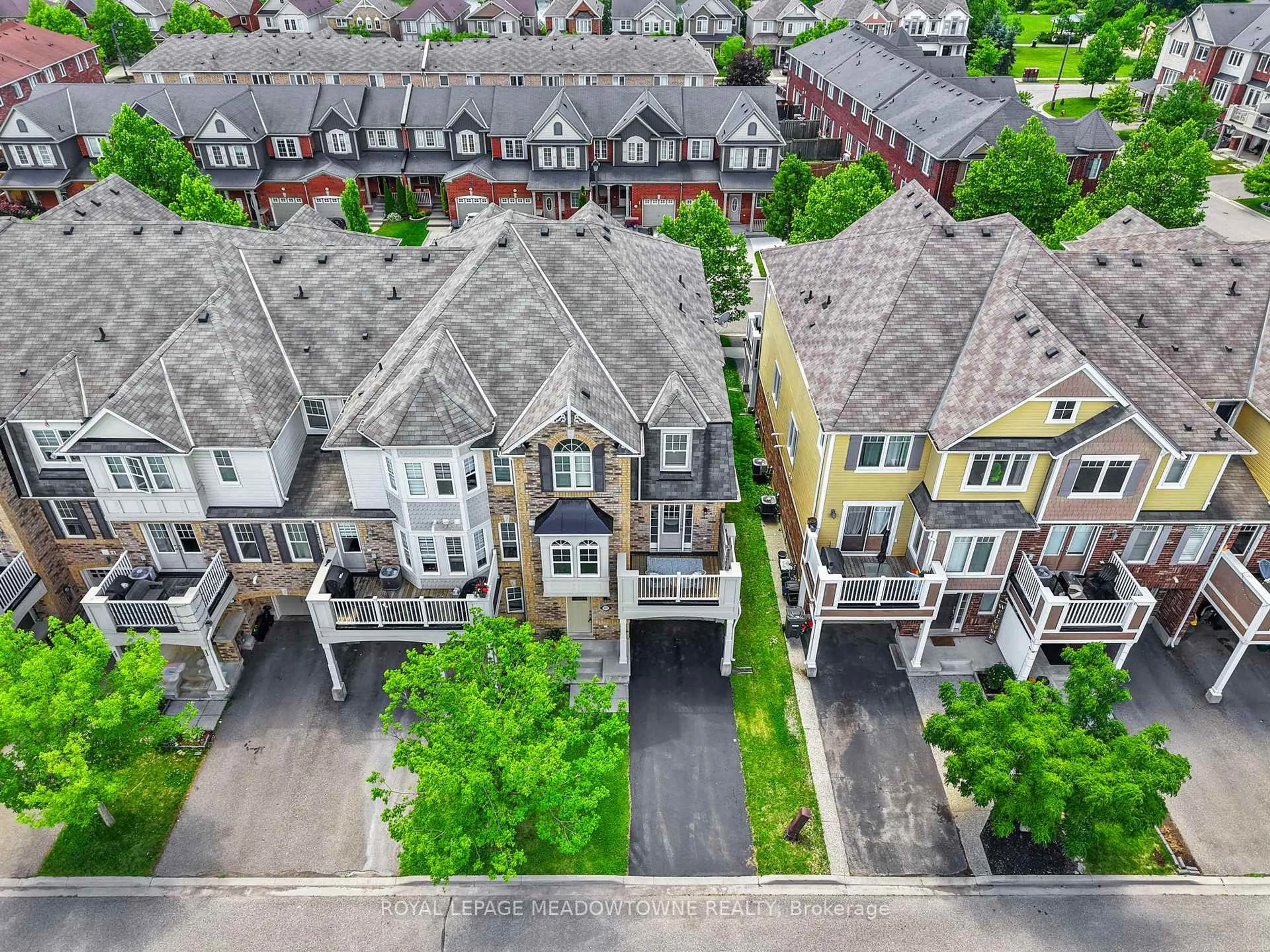 A pic from outside/outdoor area/front of a property/back of a property/a pic from drone, street for 521 Cavanagh Lane, Milton Ontario L9T 8G4
