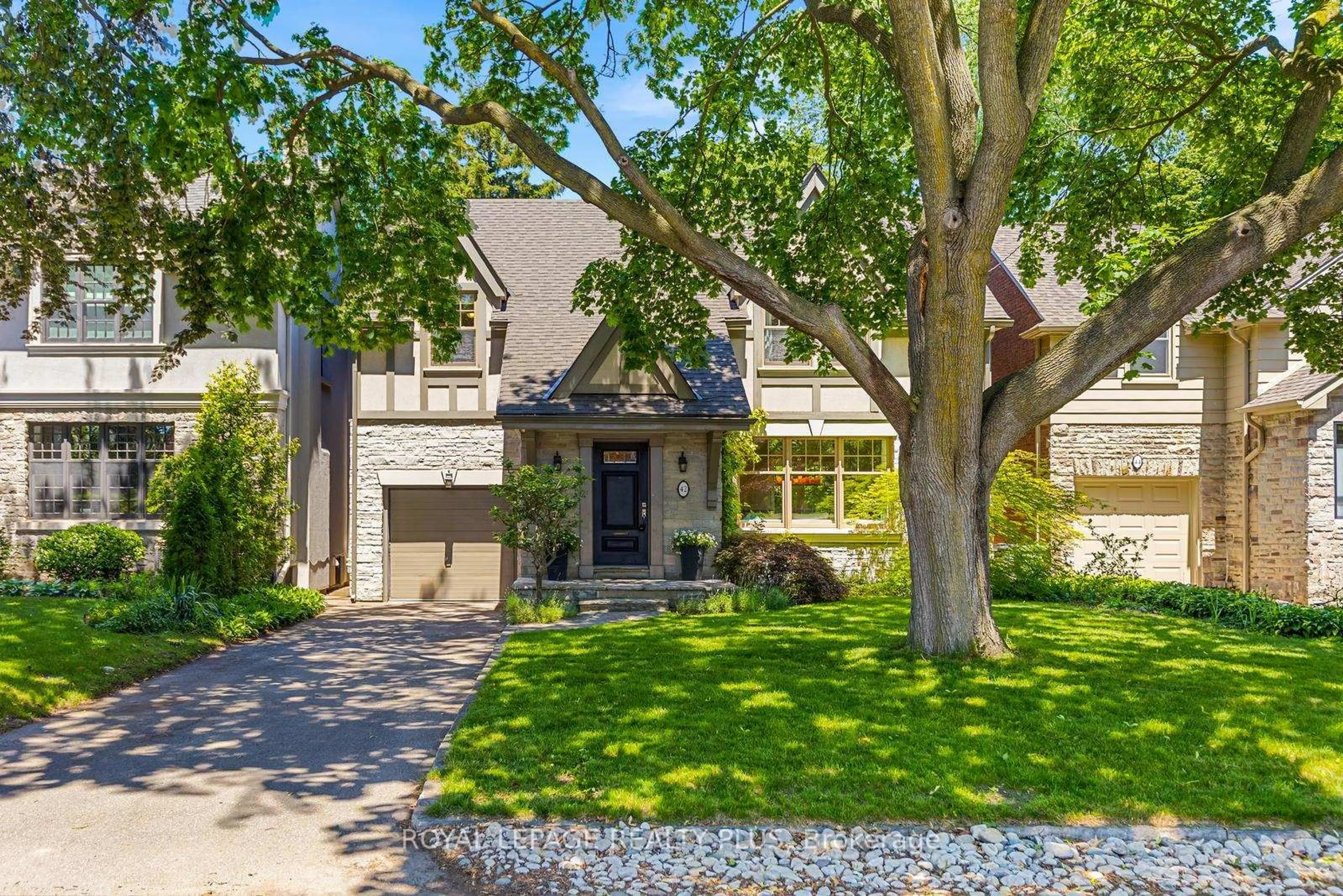 Home with brick exterior material, street for 42 Edgemore Dr, Toronto Ontario M8Y 2N3