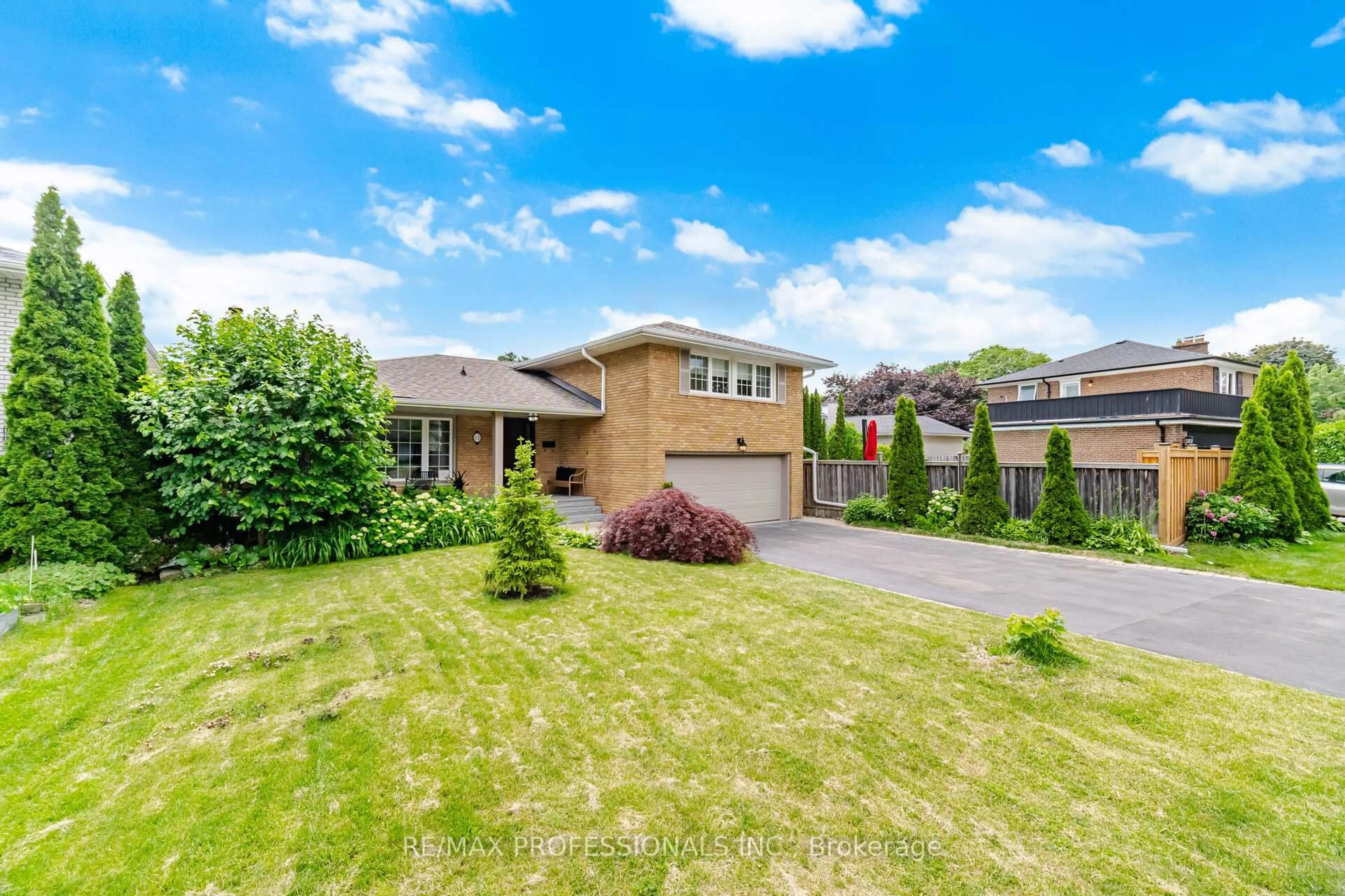 Home with brick exterior material, street for 12 Thicket Rd, Toronto Ontario M9C 2T3
