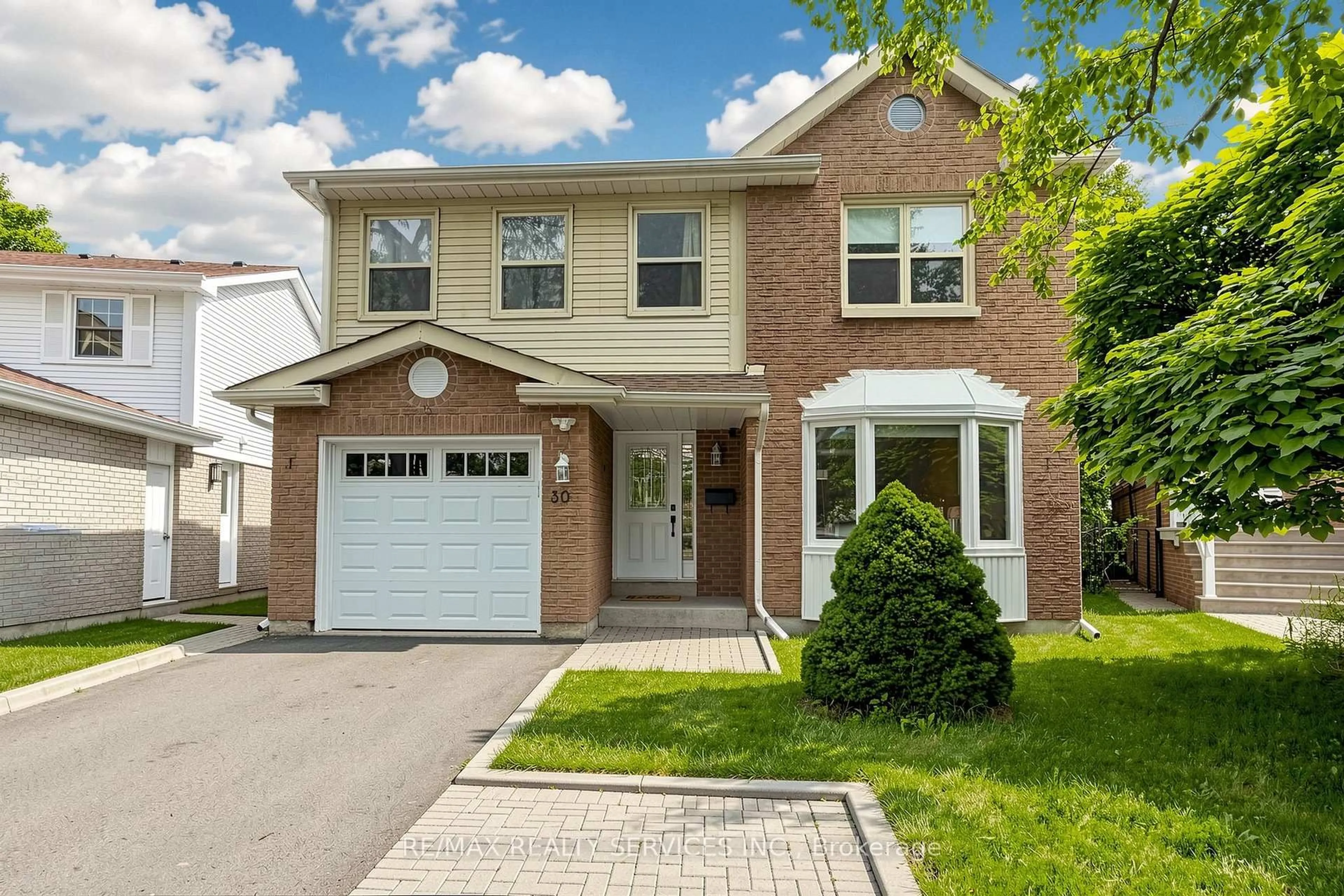 Home with brick exterior material, street for 30 Mcgillivary Cres, Brampton Ontario L6S 3P7