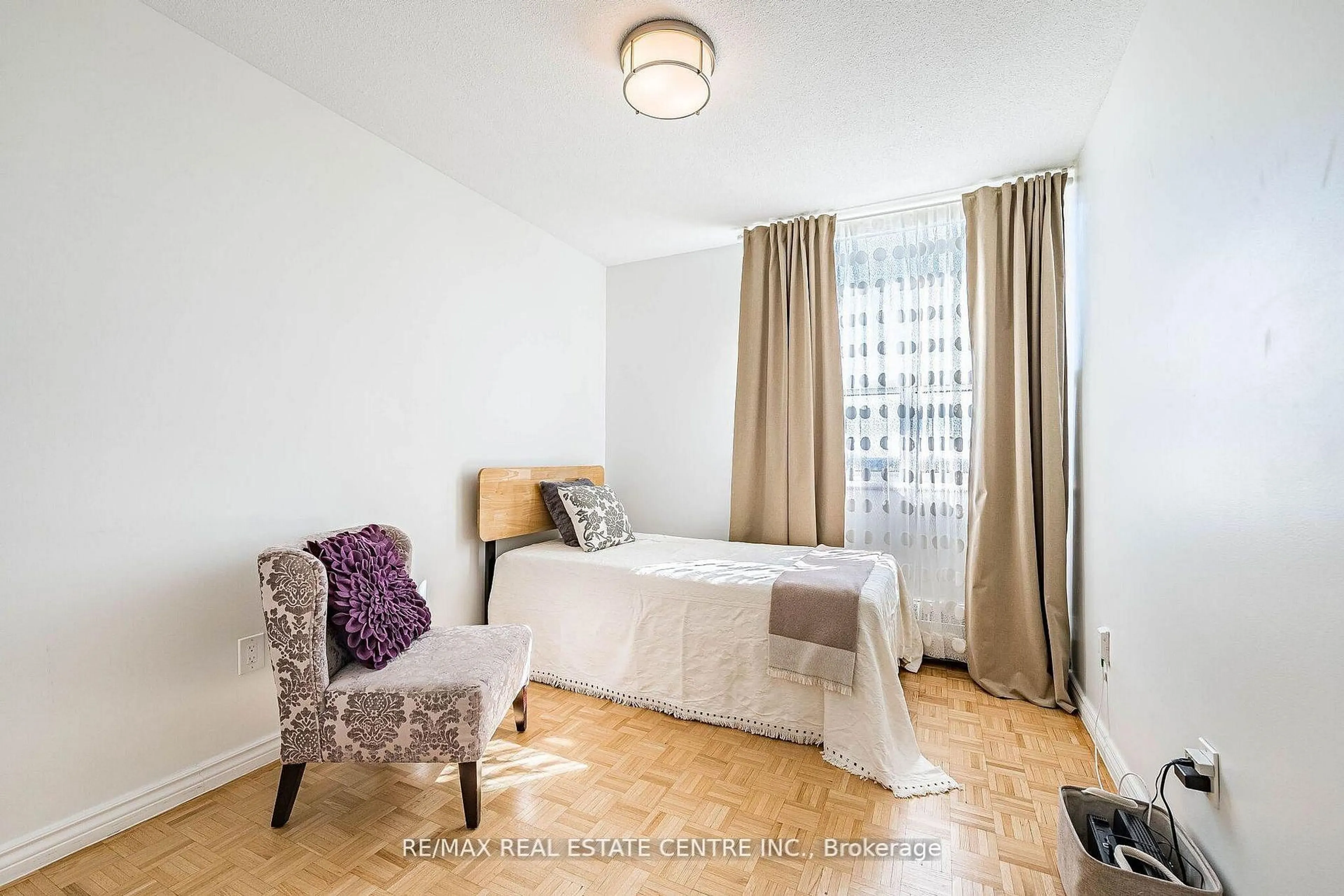 Bedroom with bed, wood/laminate floor for 451 The West Mall Dr #1502, Toronto Ontario M9C 1G1
