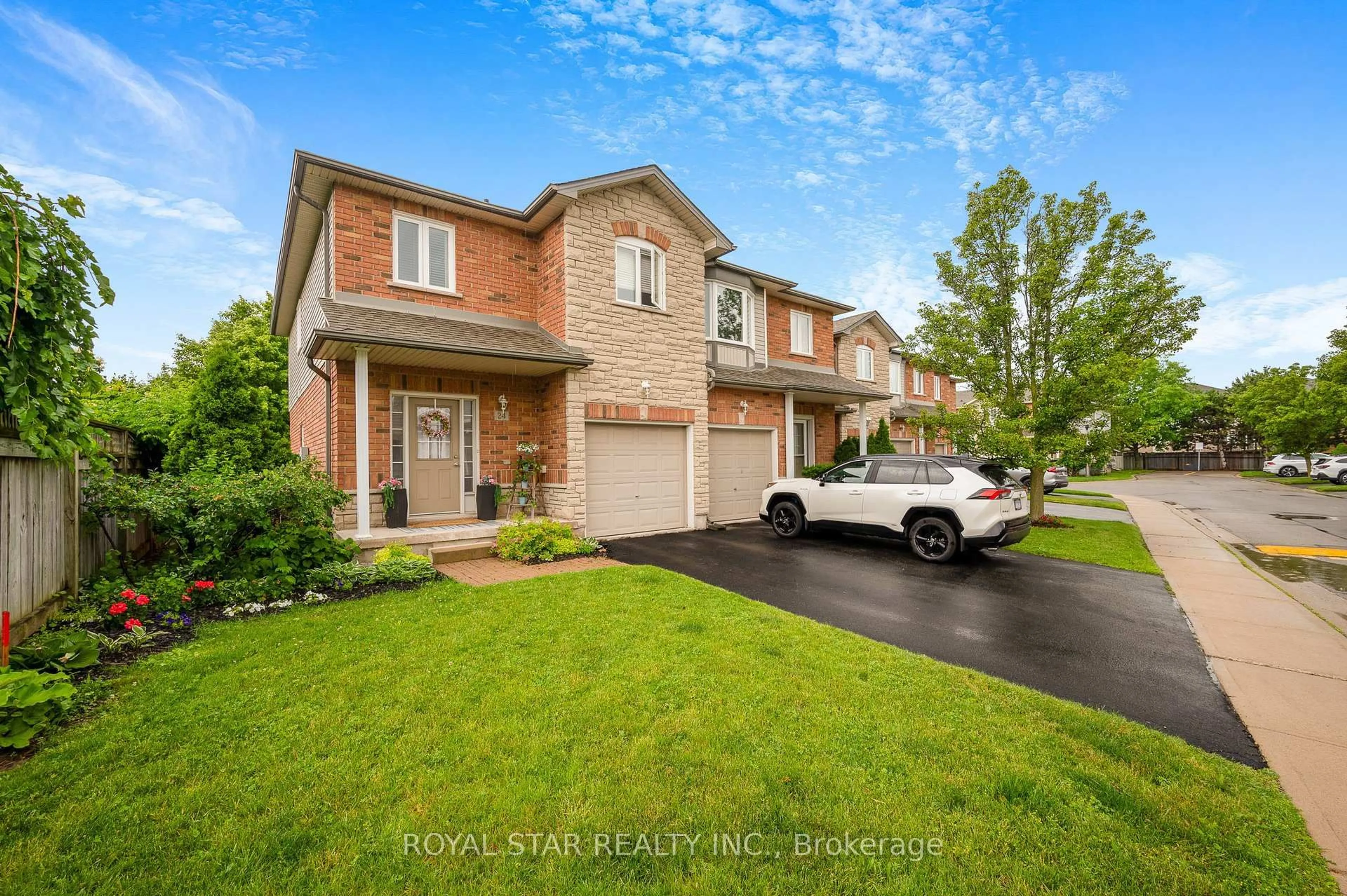 Home with brick exterior material, street for 2229 Walkers Line #24, Burlington Ontario L7M 4X4