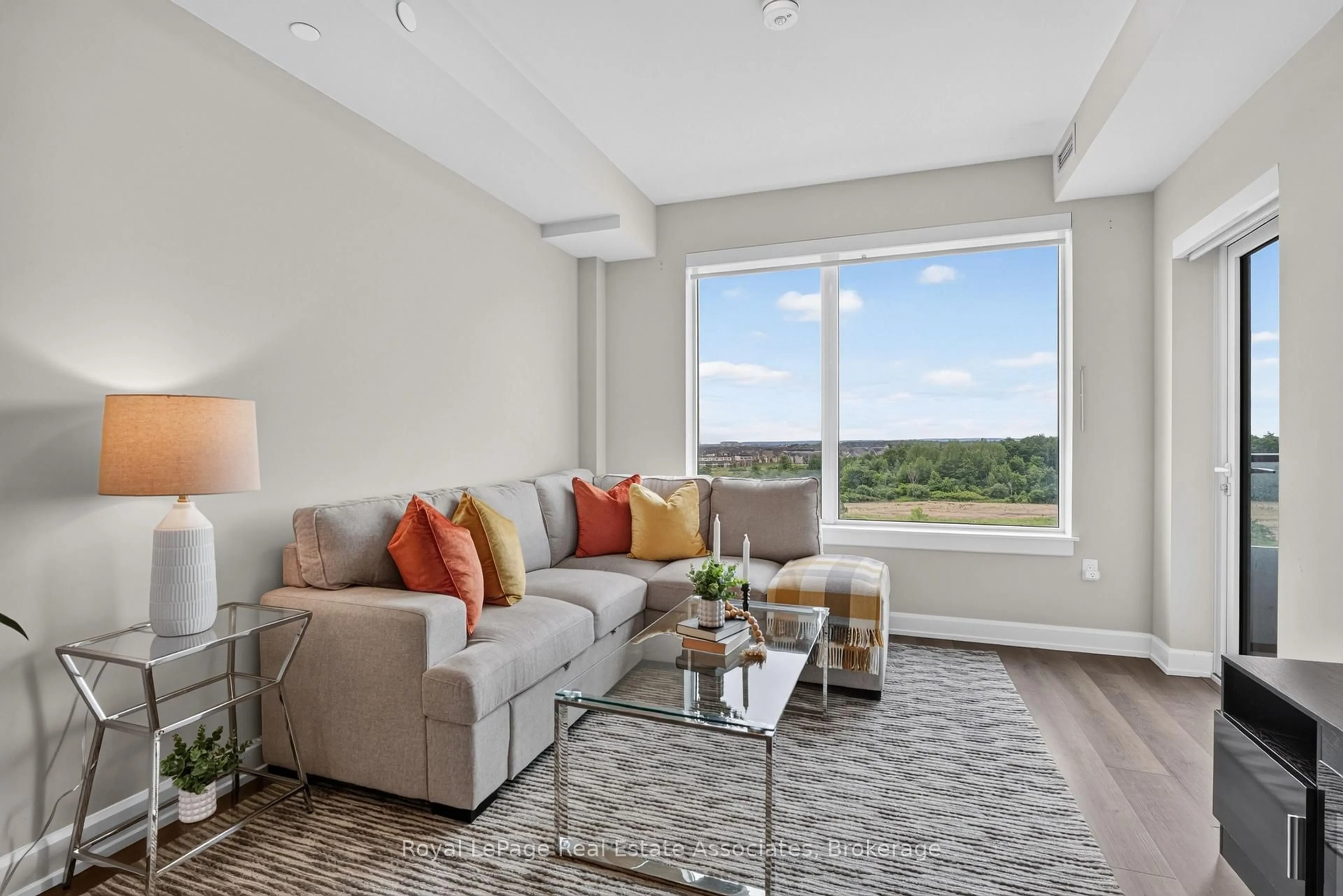 Living room with furniture, unknown for 3200 William Coltson Ave #622, Oakville Ontario L6H 7B9