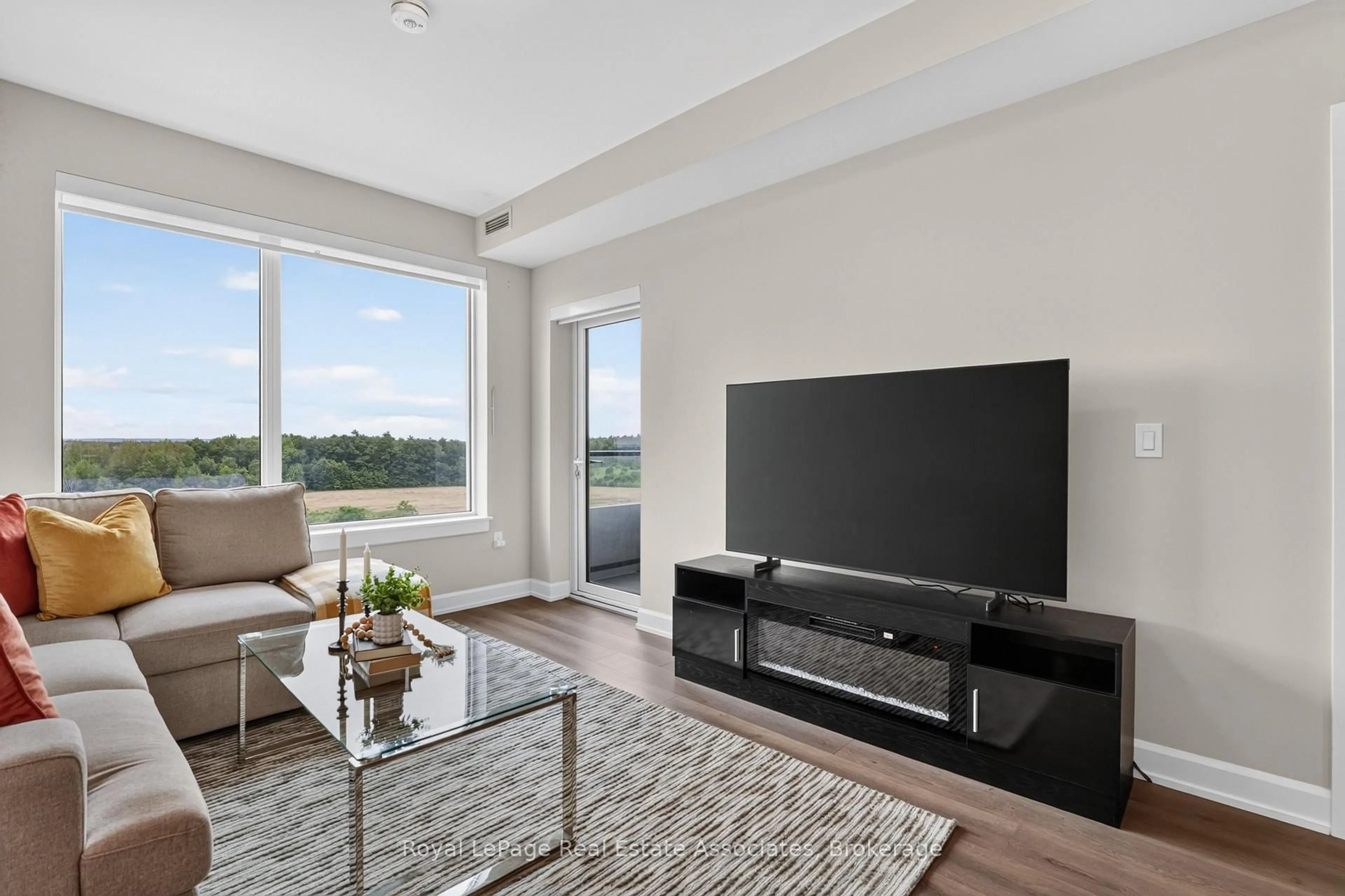 Living room with furniture, unknown for 3200 William Coltson Ave #622, Oakville Ontario L6H 7B9
