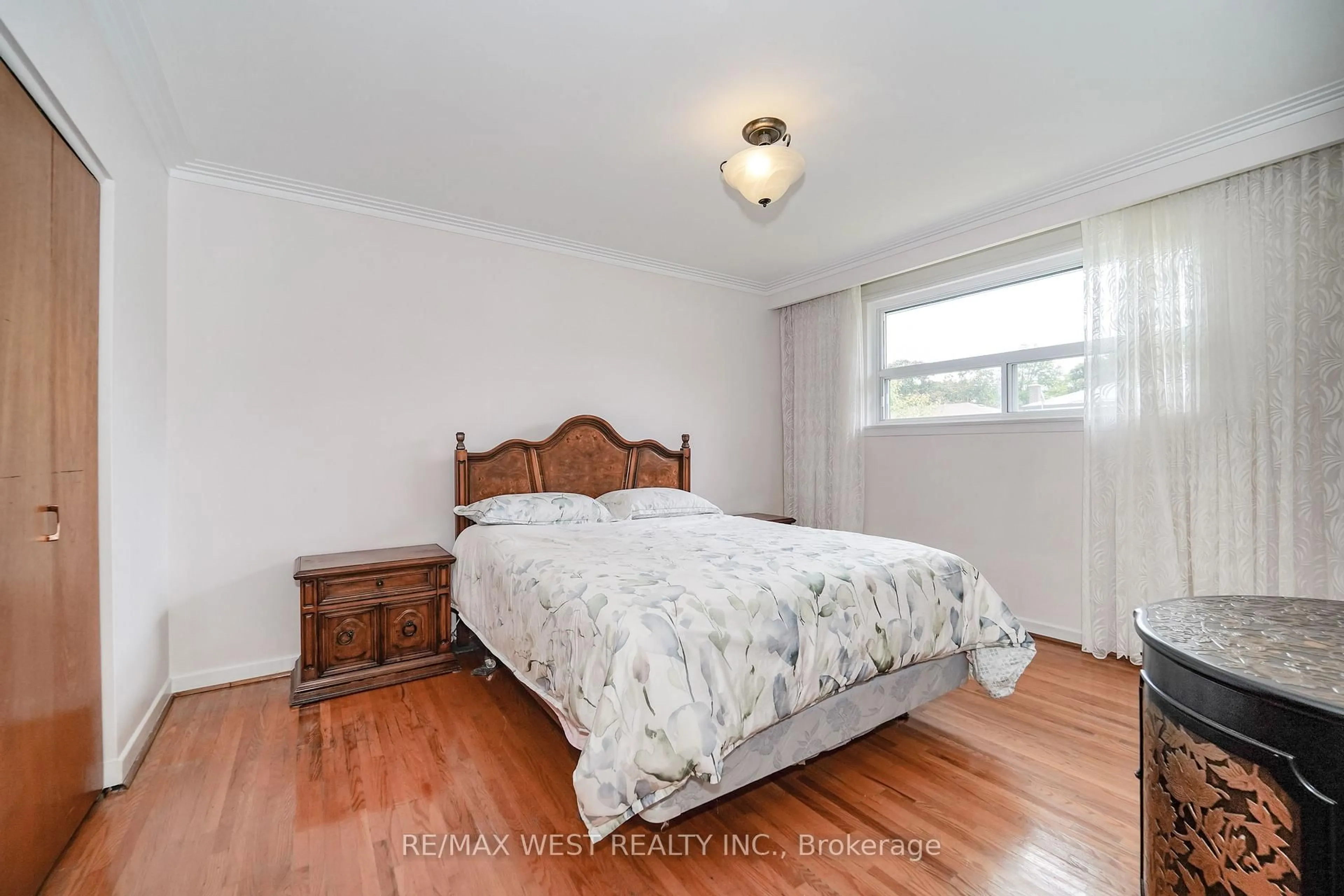 Bedroom with bed, wood/laminate floor for 65 Council Cres, Toronto Ontario M3J 1J5
