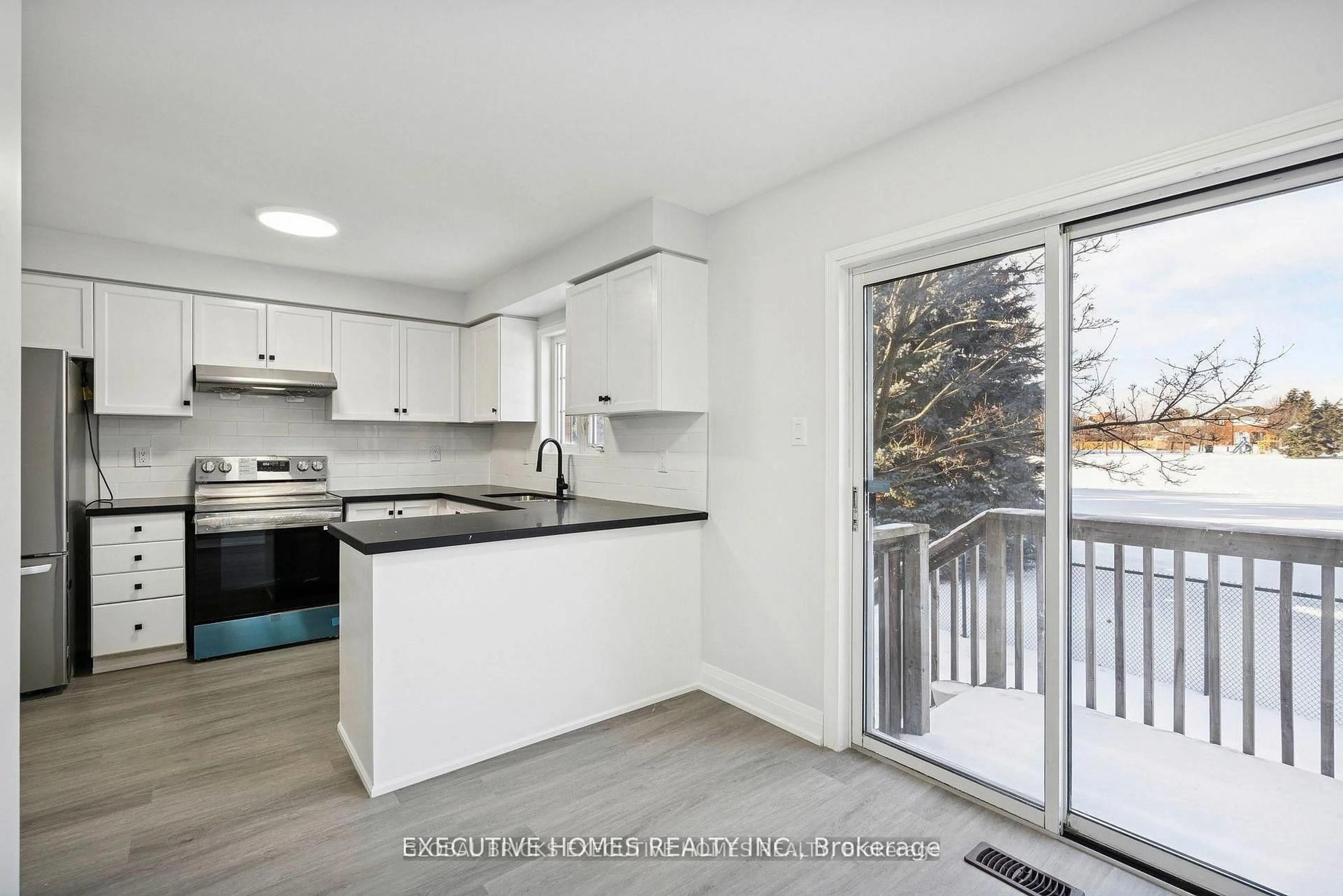 Open concept kitchen, unknown for 2665 Thomas St #60, Mississauga Ontario L5M 6G6