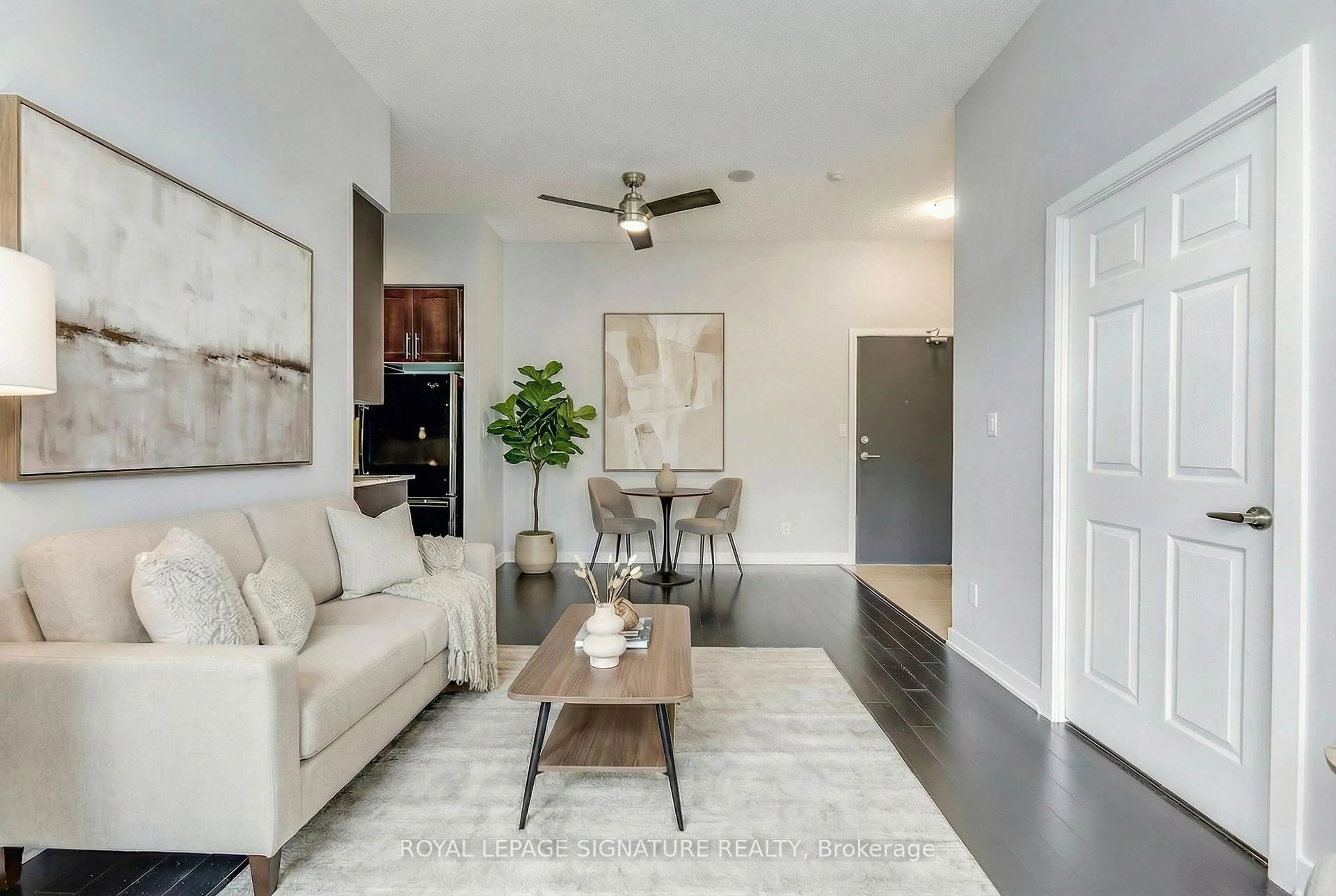 Living room with furniture, unknown for 4070 Confederation Pkwy #311, Mississauga Ontario L5B 0E9