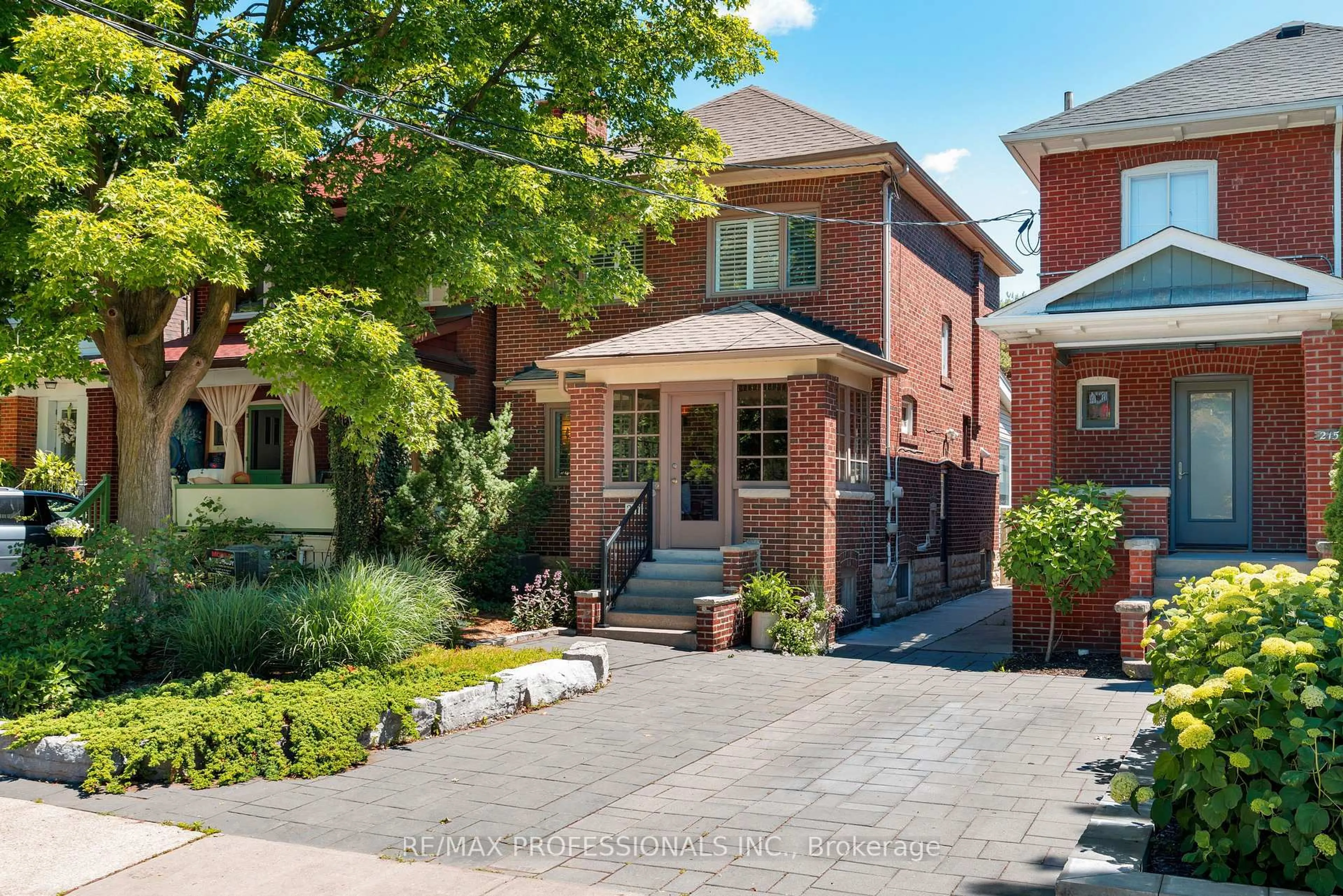 Home with brick exterior material, street for 217 Humbercrest Blvd, Toronto Ontario M6S 4L5