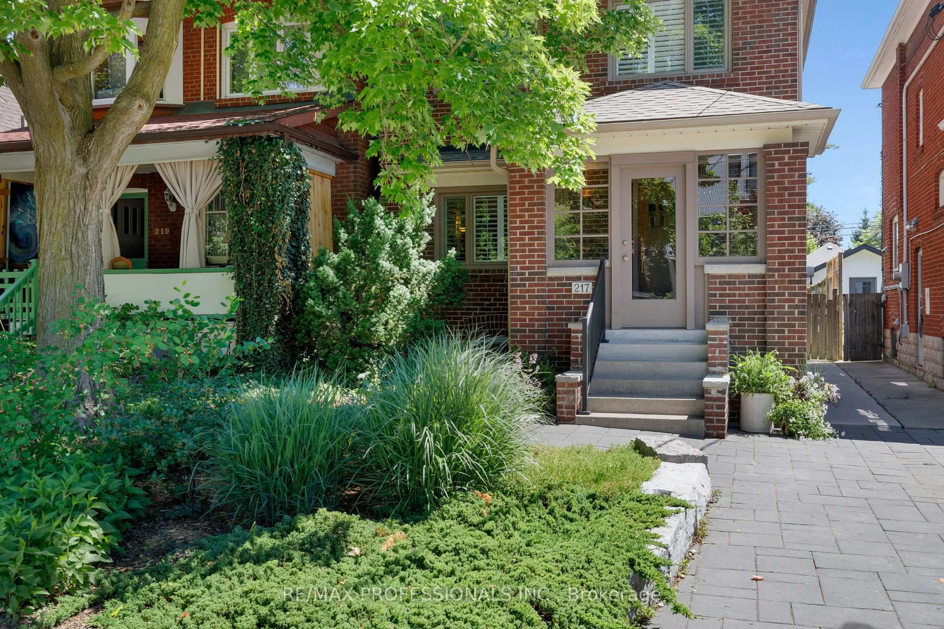 Home with brick exterior material, street for 217 Humbercrest Blvd, Toronto Ontario M6S 4L5
