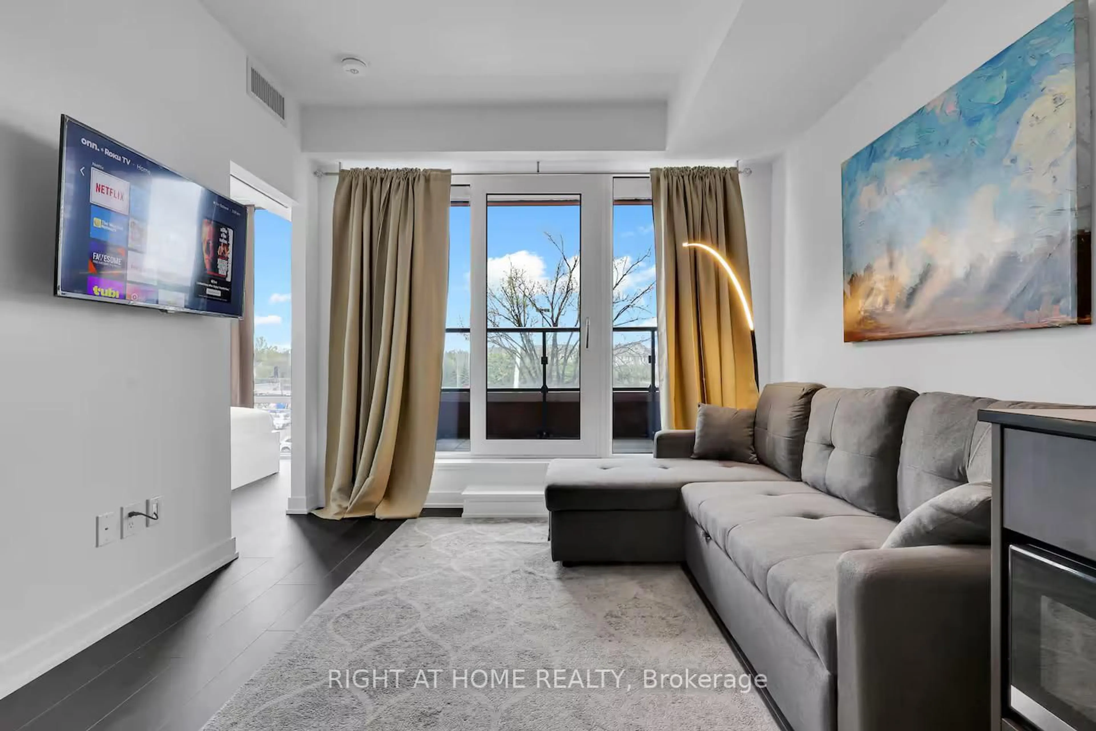 Living room with furniture, unknown for 28 Ann St #223, Mississauga Ontario L5G 0E1