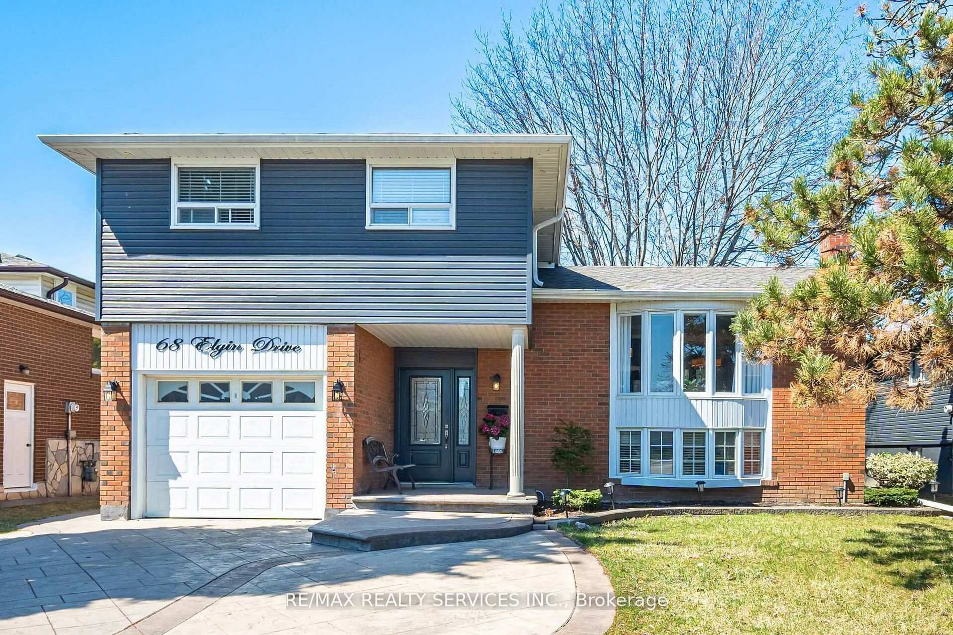 Home with brick exterior material, street for 68 Elgin Dr, Brampton Ontario L6Y 1A8