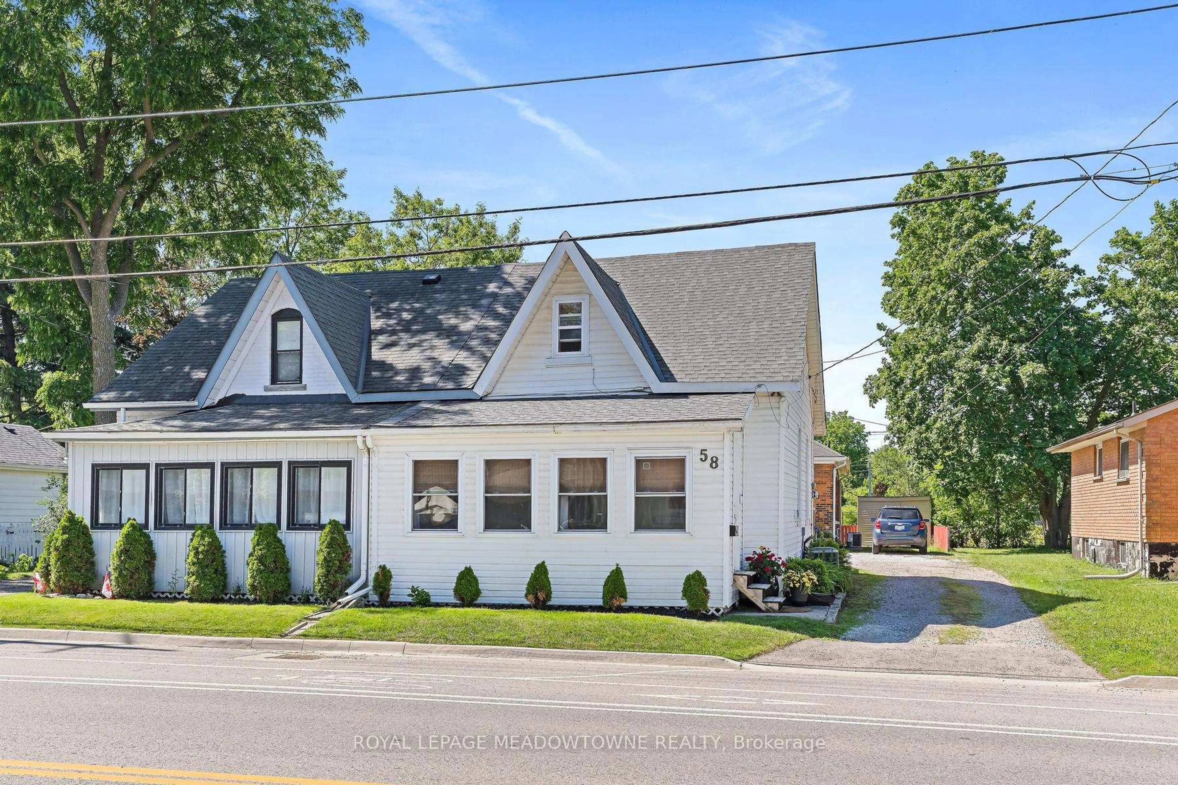 Home with brick exterior material, street for 58 Young St, Halton Hills Ontario L7J 2G6