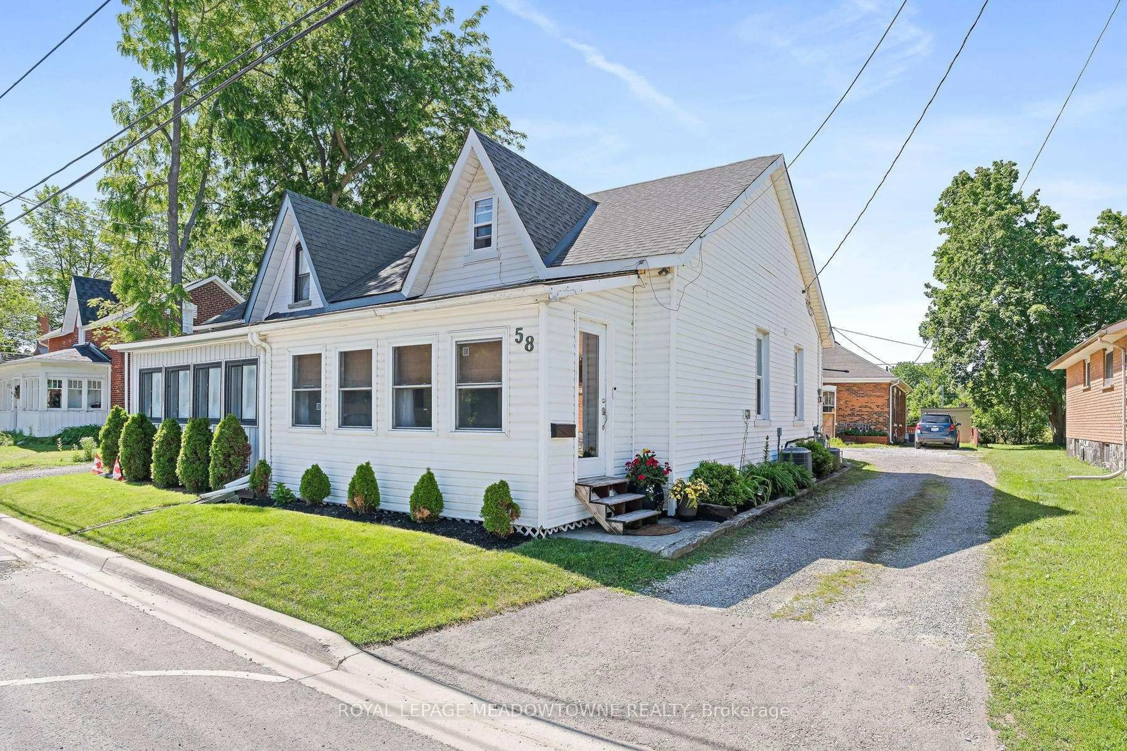 Home with brick exterior material, street for 58 Young St, Halton Hills Ontario L7J 2G6
