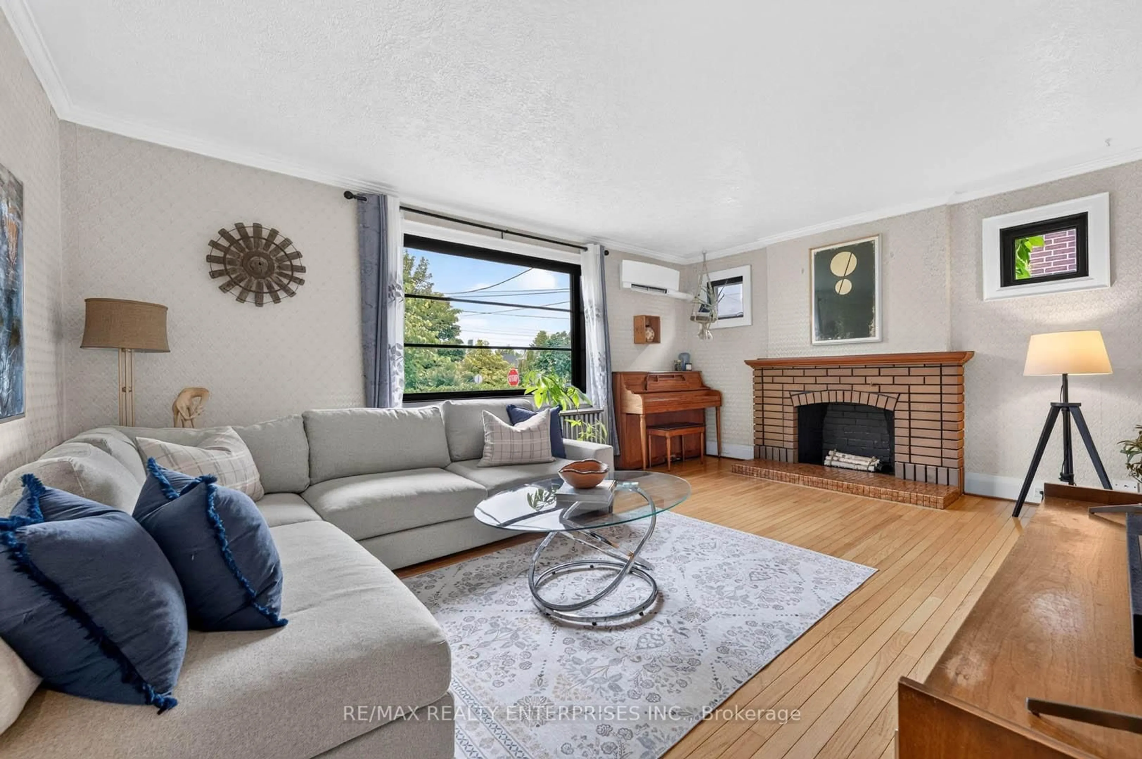 Living room with furniture, unknown for 233 Rosemount Ave, Toronto Ontario M9N 3C5