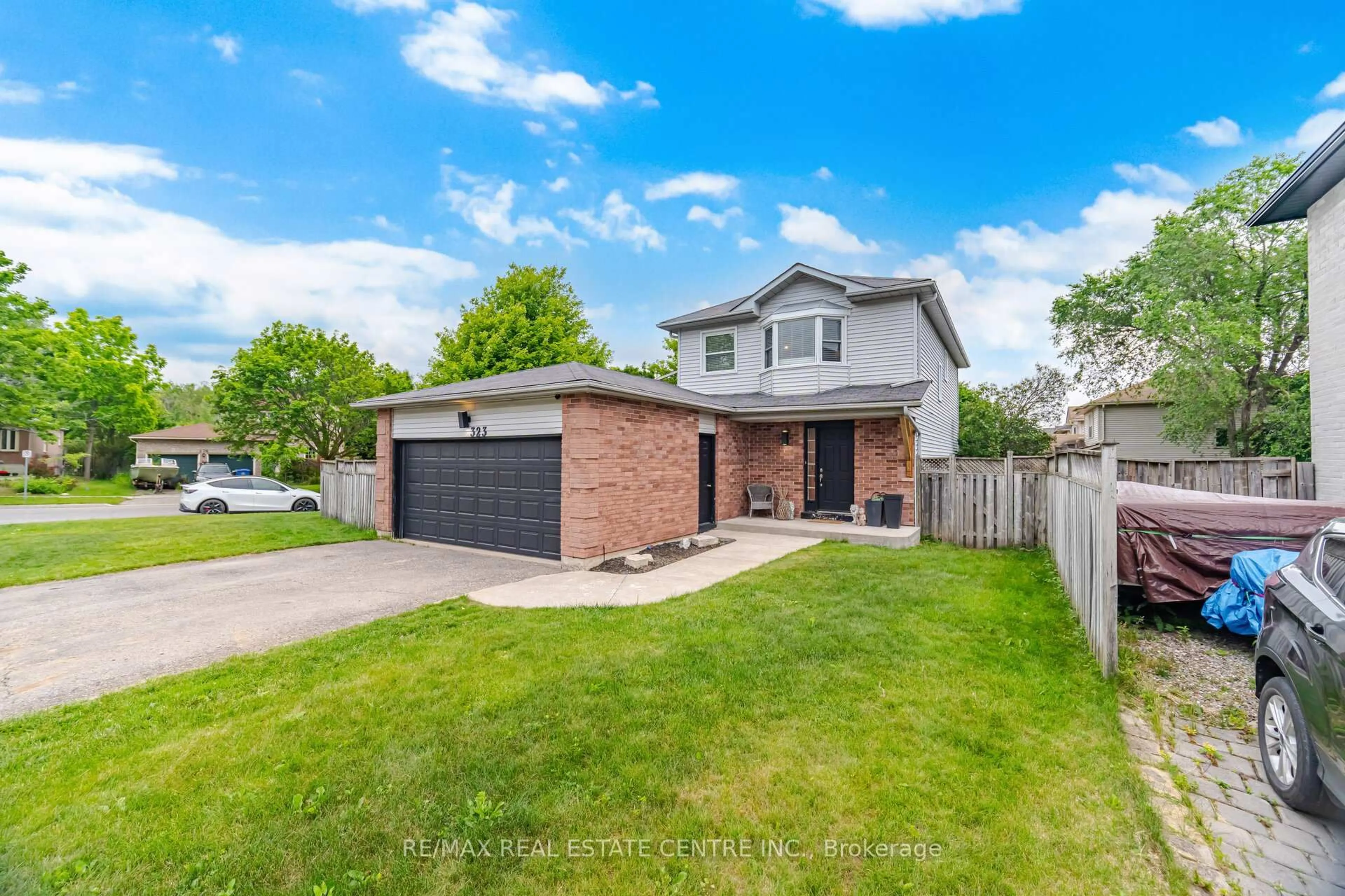 Home with brick exterior material, street for 323 Michael Dr, Orangeville Ontario L9W 4P4