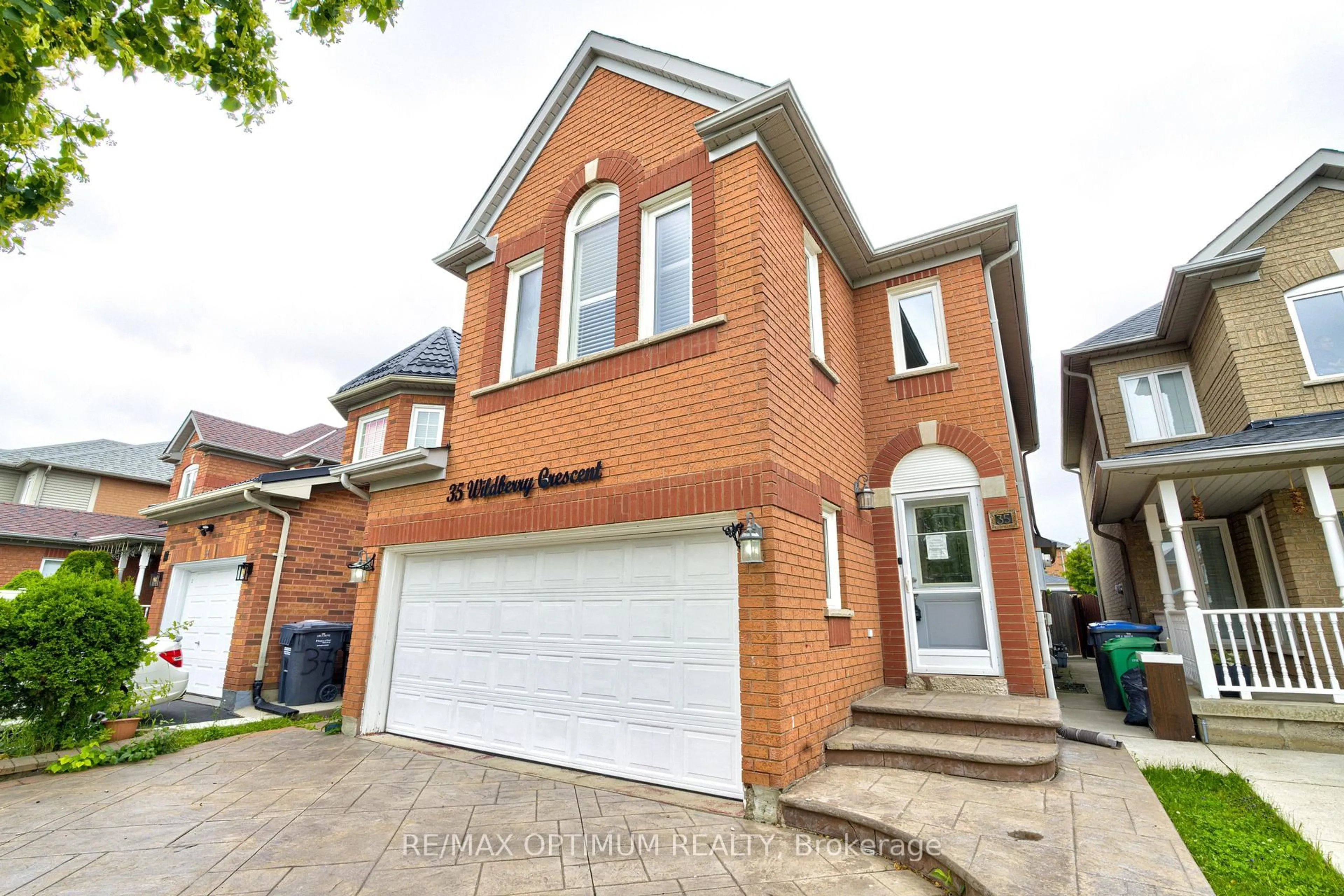 Home with brick exterior material, street for 35 Wildberry Cres, Brampton Ontario L6R 1K1