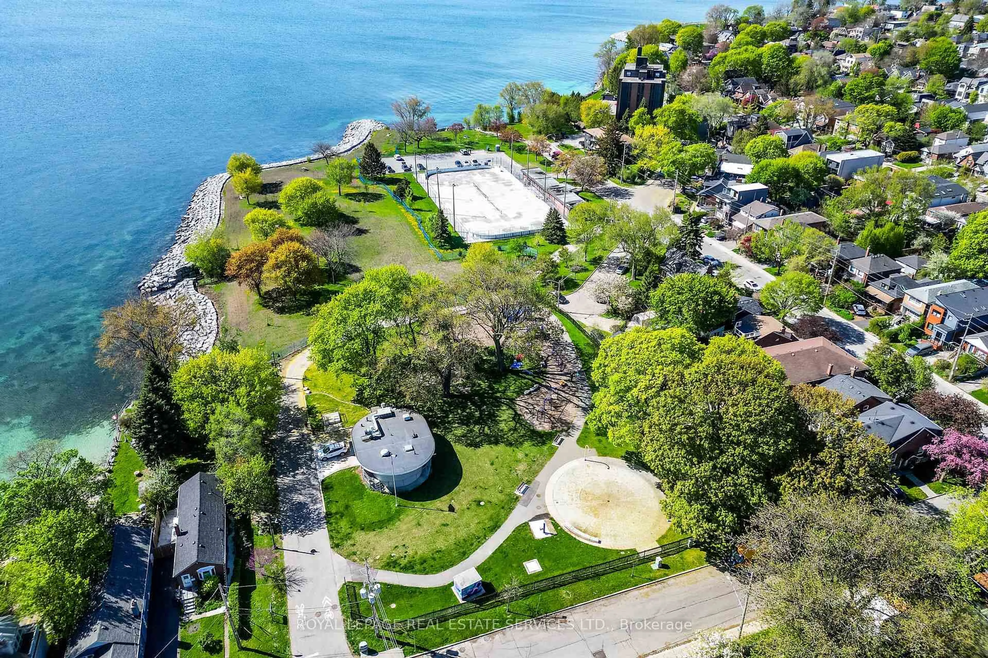 A pic from outside/outdoor area/front of a property/back of a property/a pic from drone, water/lake/river/ocean view for 47 Third St, Toronto Ontario M8V 2X7