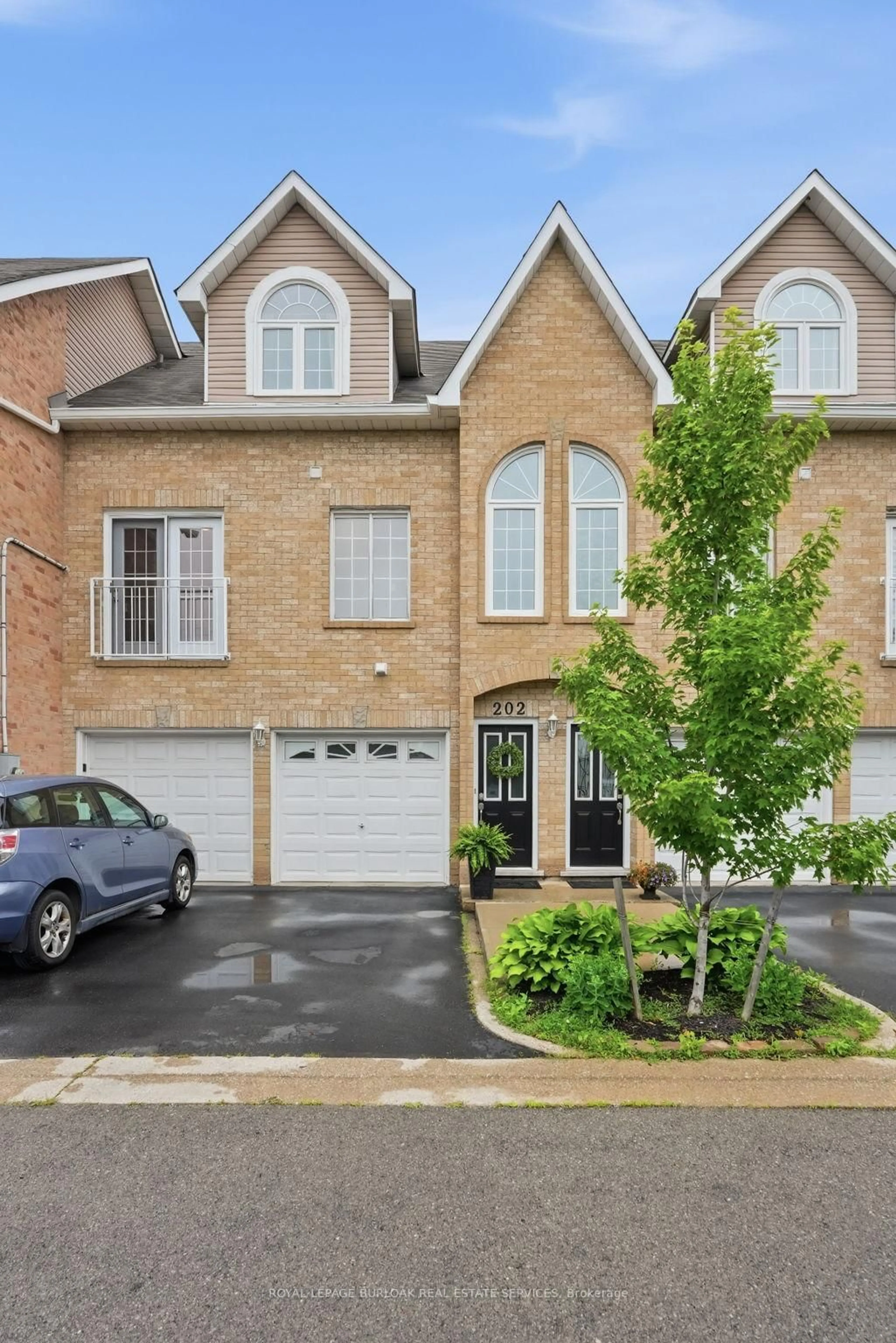 Home with brick exterior material, street for 2055 Walkers Line #202, Burlington Ontario L7M 4B5