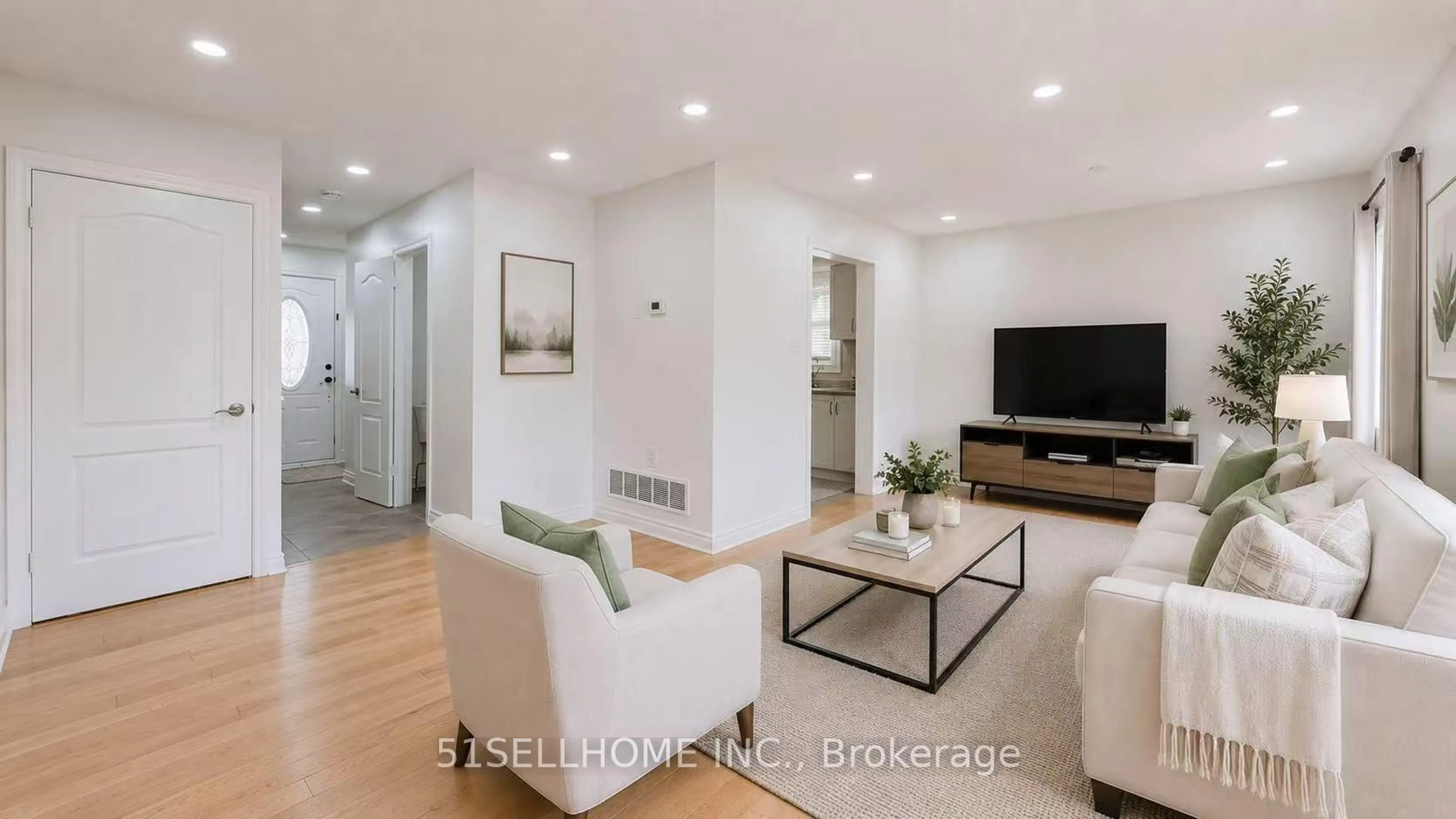 Living room with furniture, wood/laminate floor for 846 Savoy Cres, Mississauga Ontario L5R 3C7