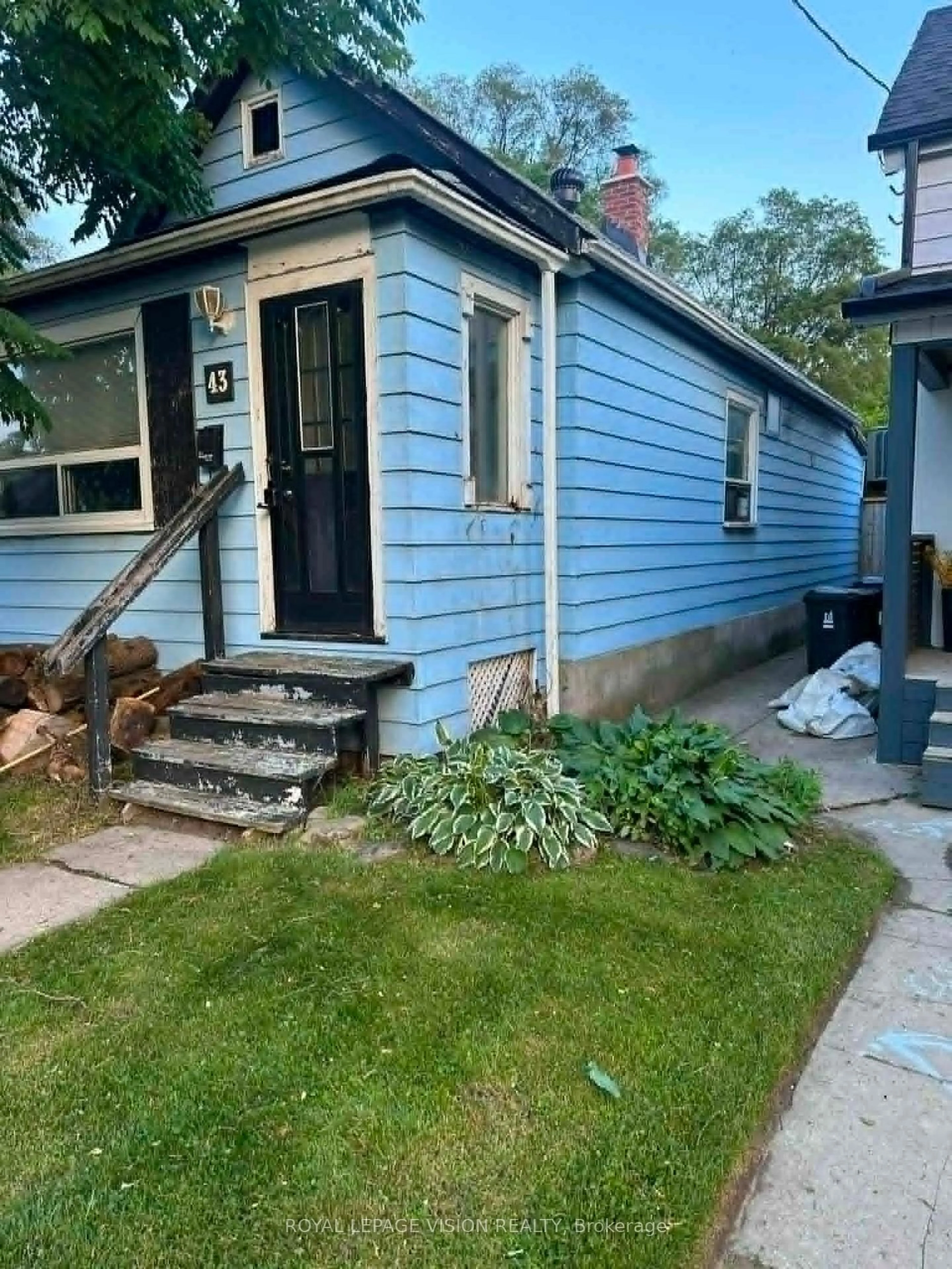 Home with vinyl exterior material, street for 43 Jillson Ave, Toronto Ontario M6S 2P3