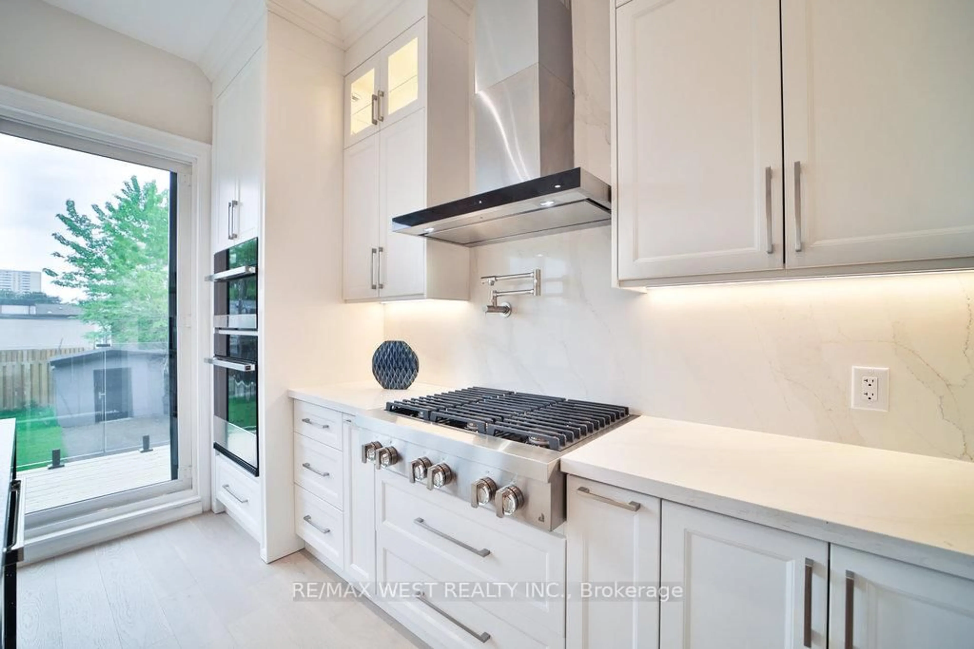 Contemporary kitchen, ceramic/tile floor for 133 Times Rd, Toronto Ontario M6B 3M3