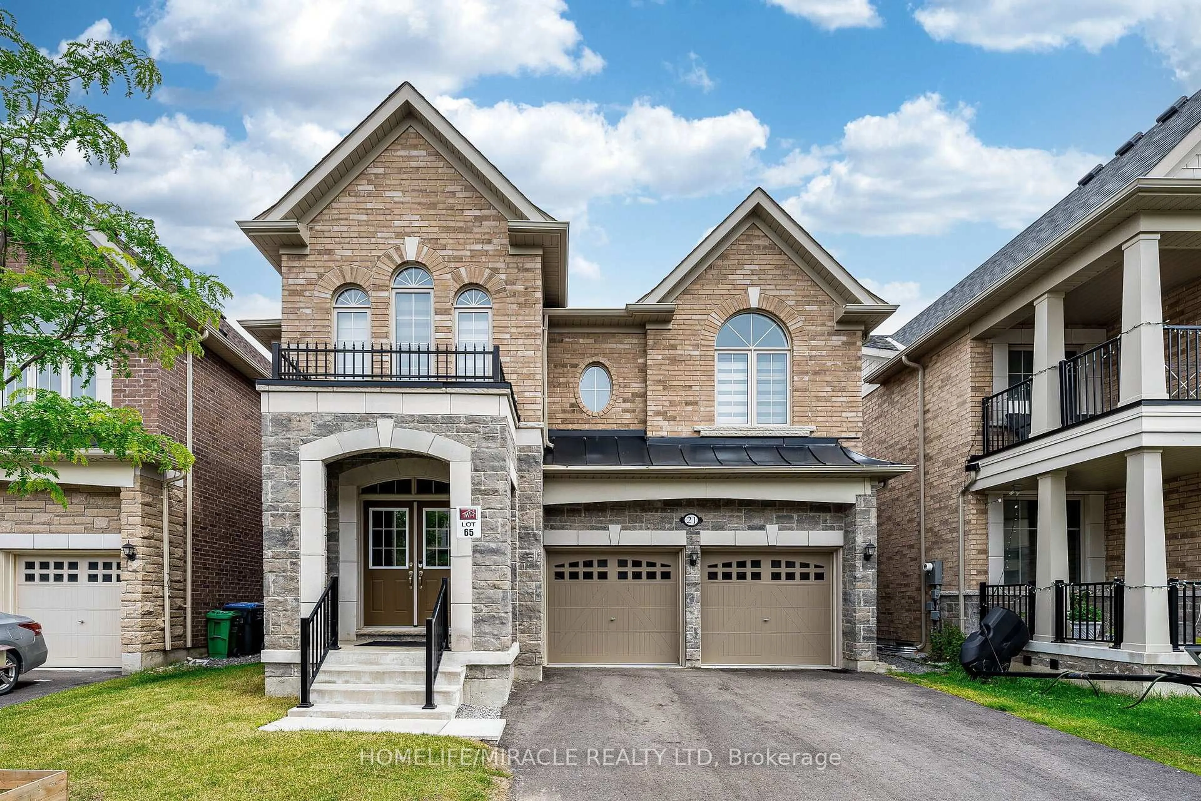 Home with brick exterior material, street for 21 Junior Rd, Brampton Ontario L7A 5J4