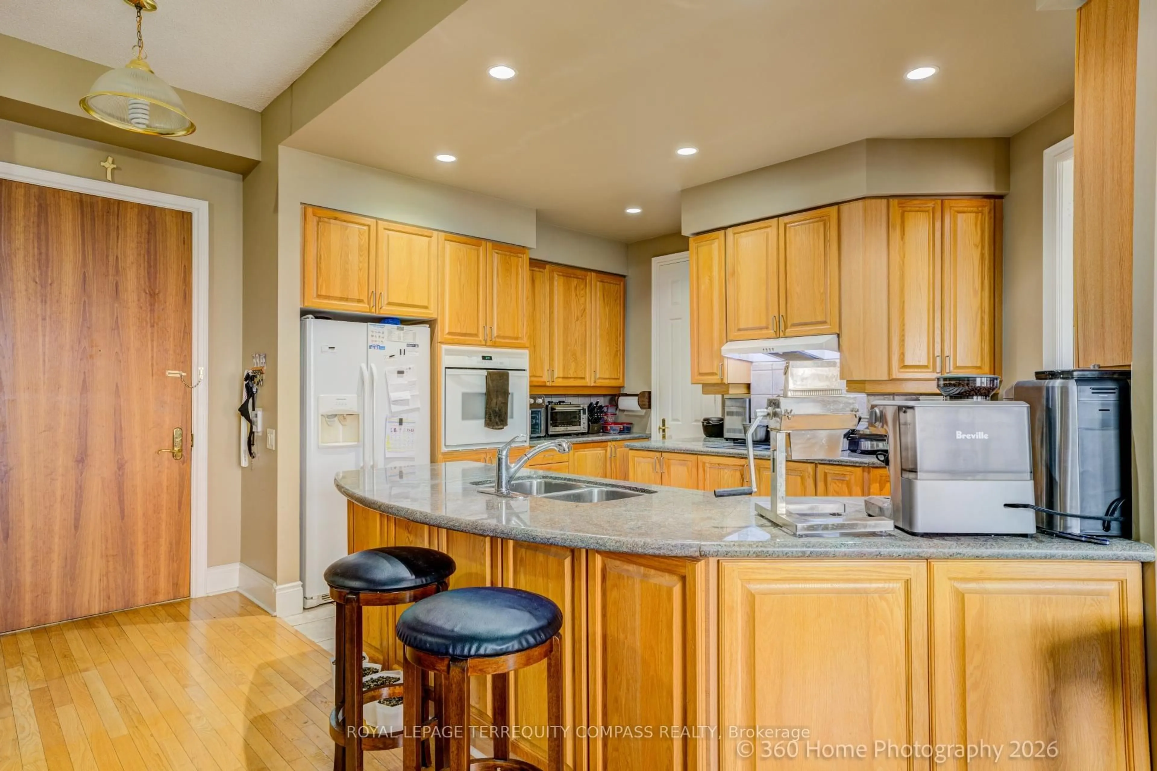 Open concept kitchen, unknown for 25 Kingsbridge Garden Circ #TPH6, Mississauga Ontario L5R 4B1