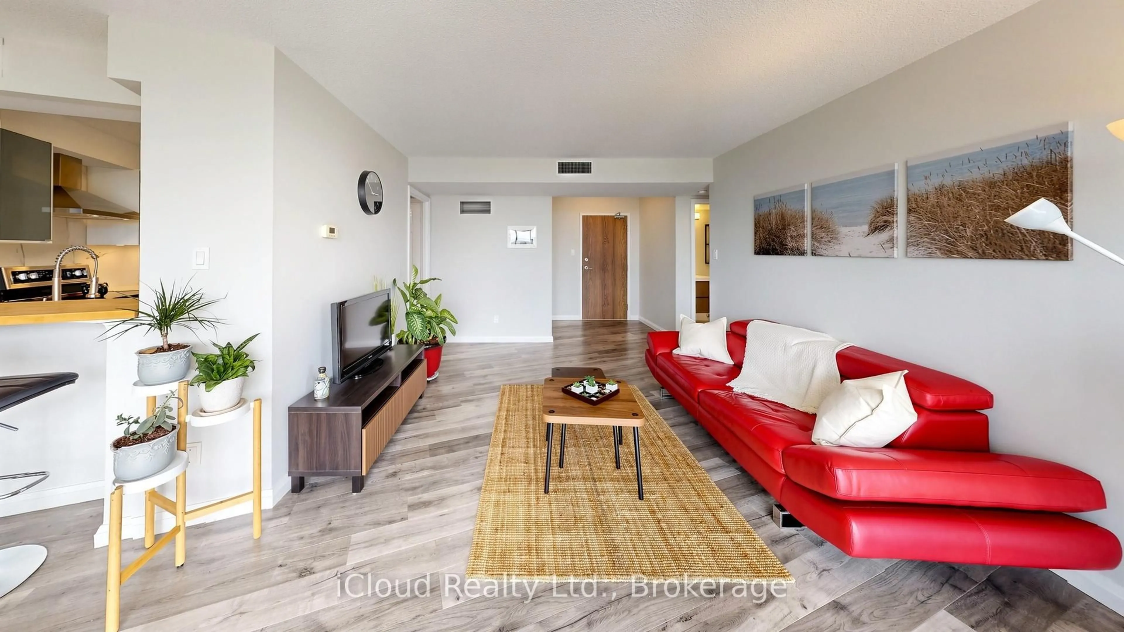 Living room with furniture, wood/laminate floor for 1230 Marlborough Crt #1005, Oakville Ontario L6H 3K6