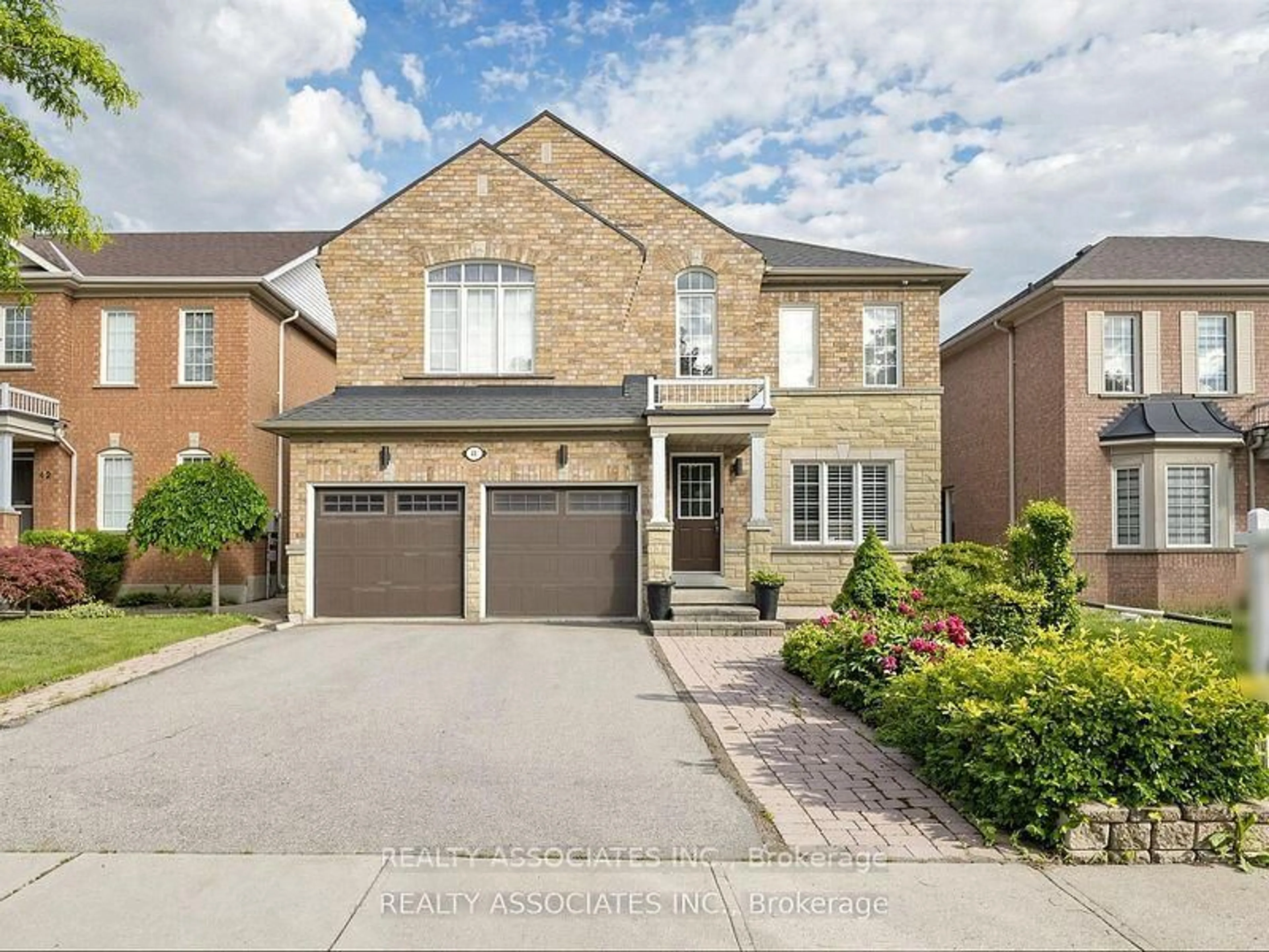 Home with brick exterior material, street for 44 Shining Willow Cres, Brampton Ontario L6P 2A2