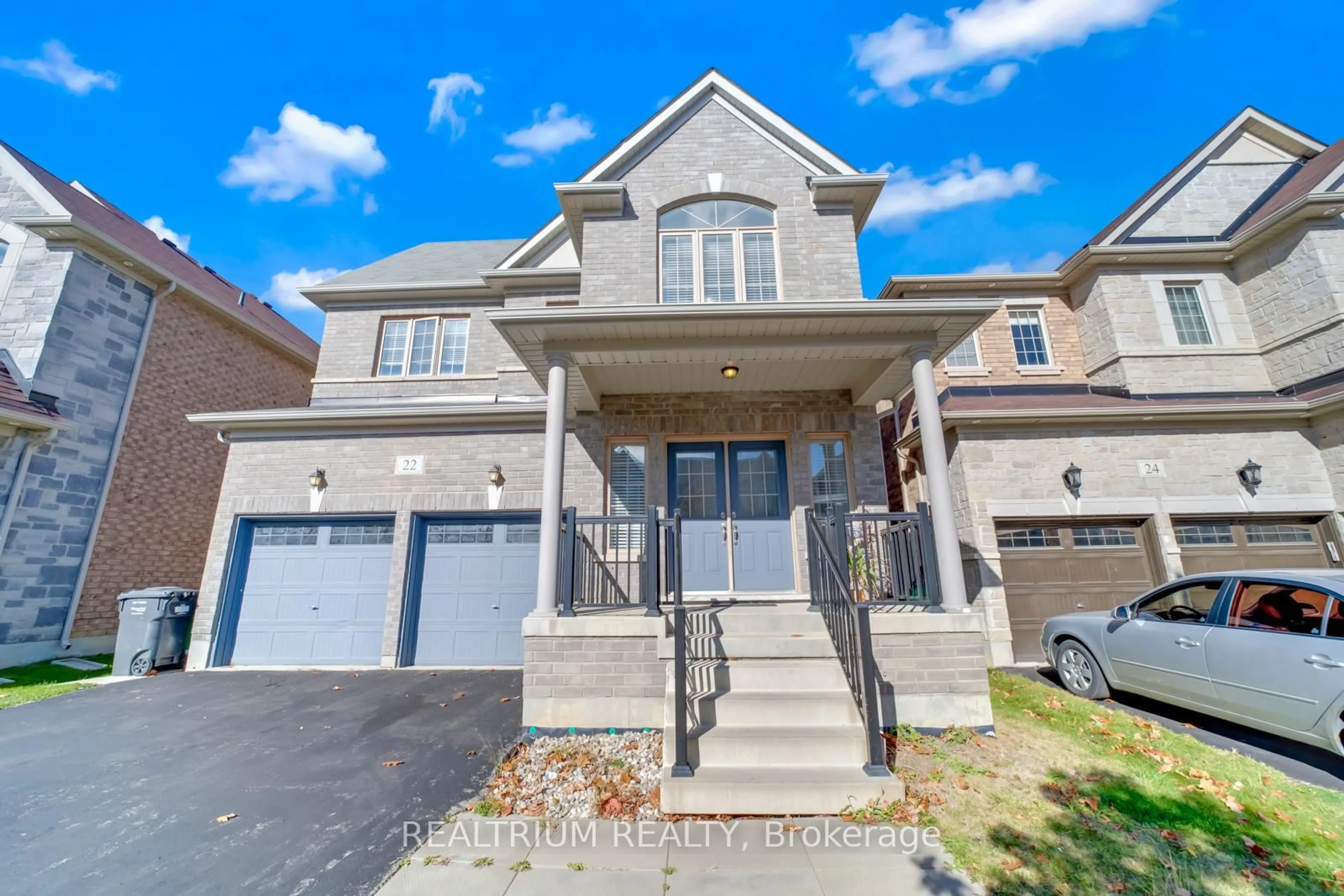 Home with brick exterior material, street for 22 Clockwork Dr, Brampton Ontario L7A 4R8