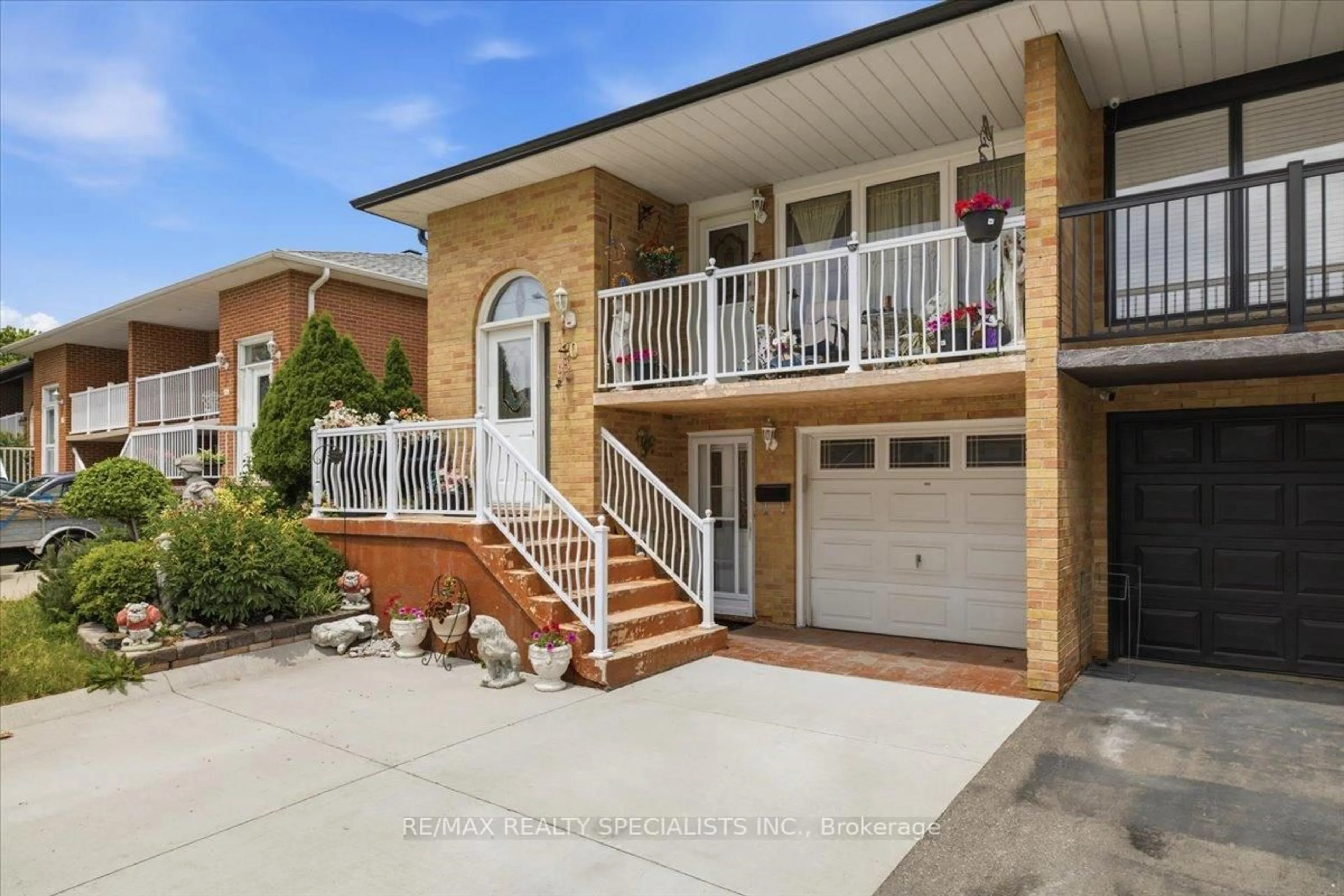 Home with brick exterior material, street for 80 Chalfield Lane, Mississauga Ontario L4Z 1L2