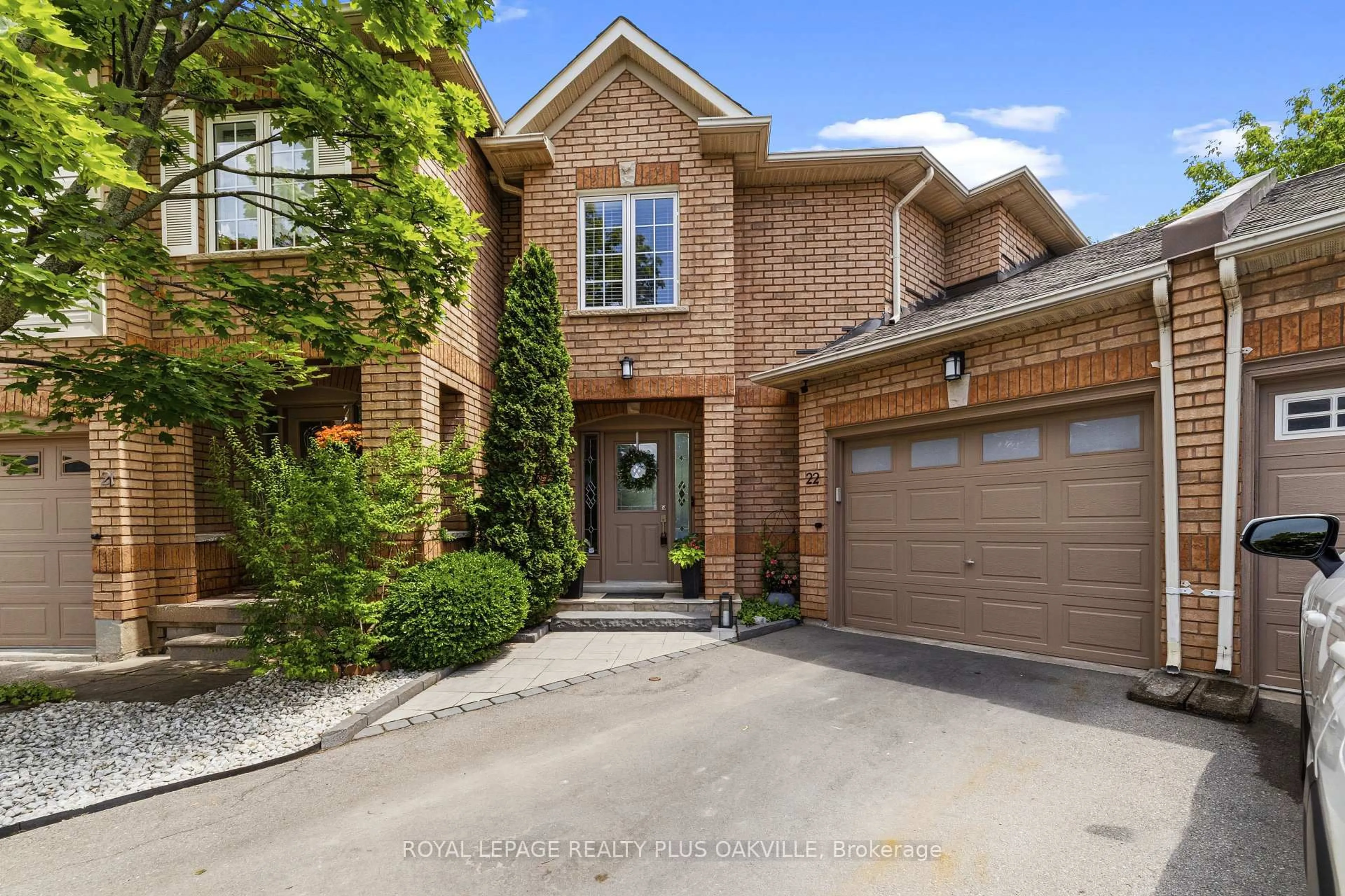 Home with brick exterior material, street for 1489 Heritage Way #22, Oakville Ontario L6M 4M6