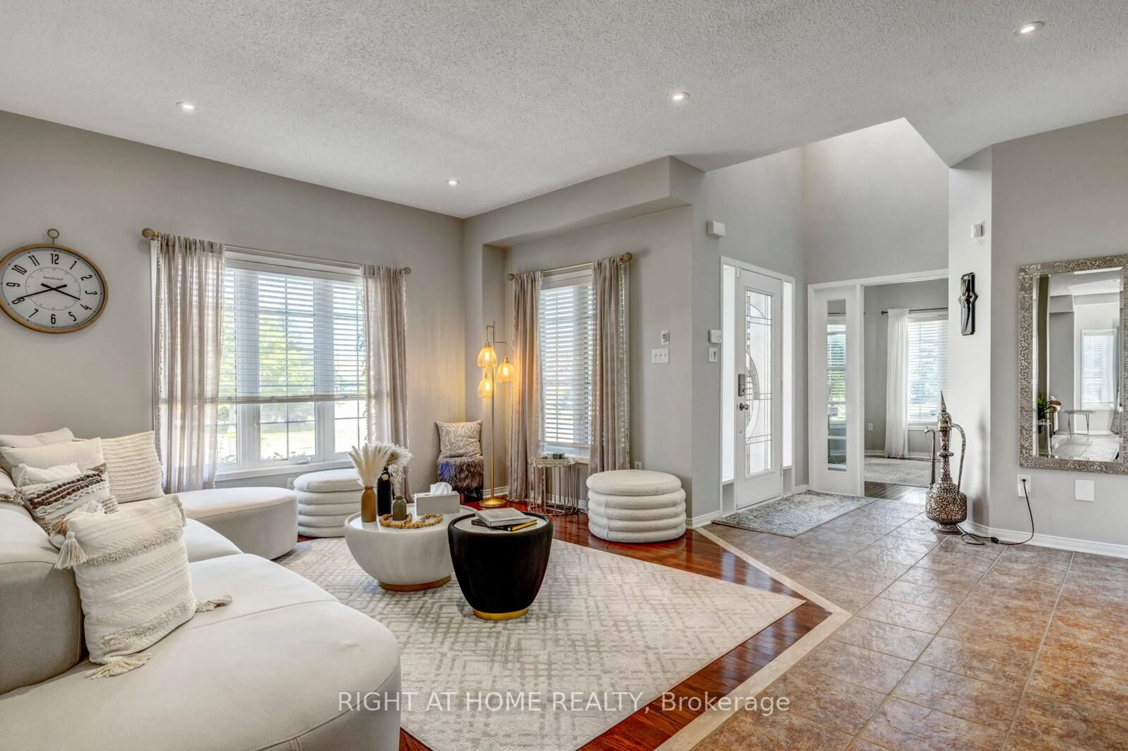 Living room with furniture, ceramic/tile floor for 4936 Sebastian Dr, Mississauga Ontario L5M 7N8