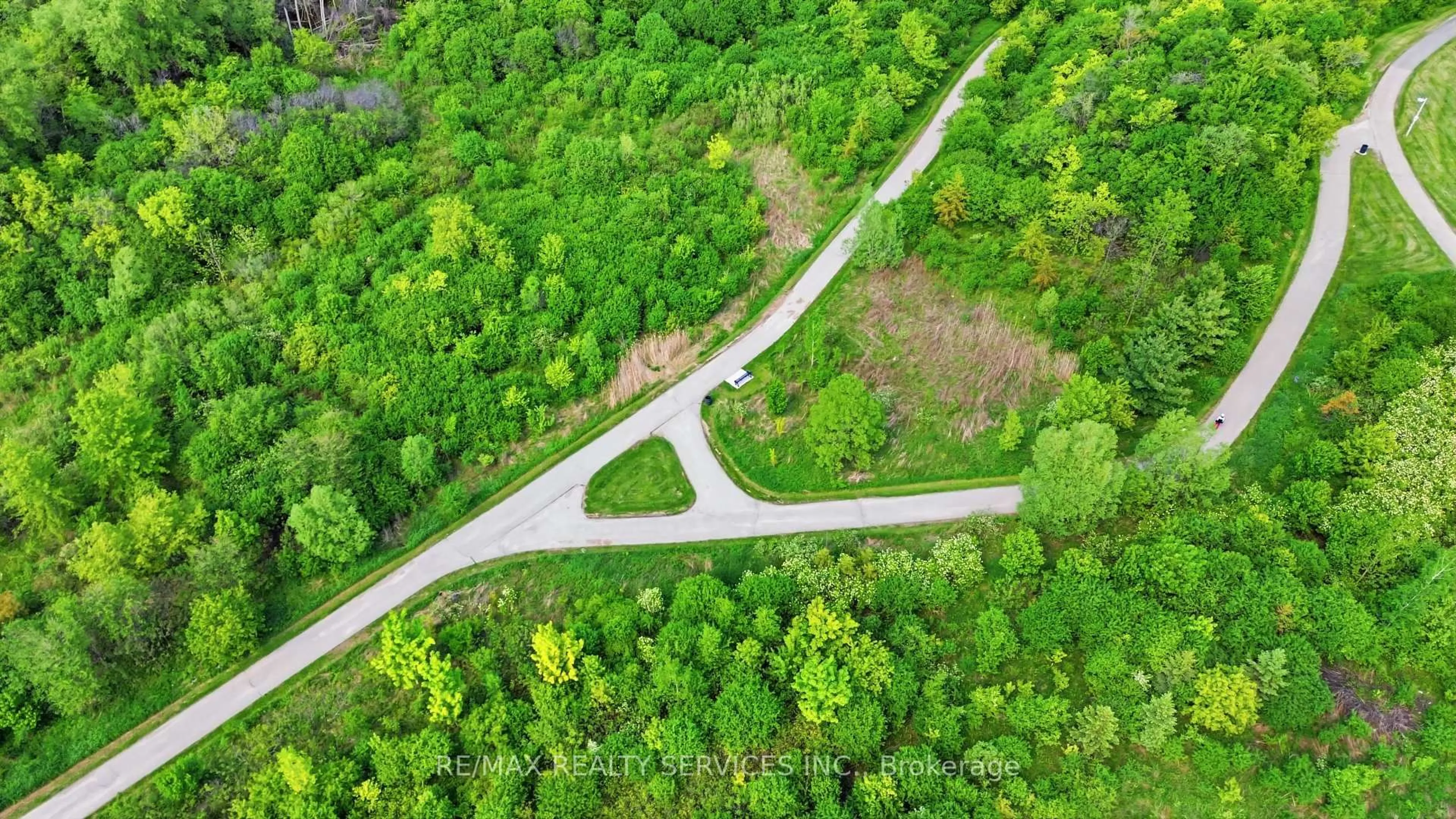 A pic from outside/outdoor area/front of a property/back of a property/a pic from drone, forest/trees view for 20 Switchback Tr, Brampton Ontario L6R 3G9