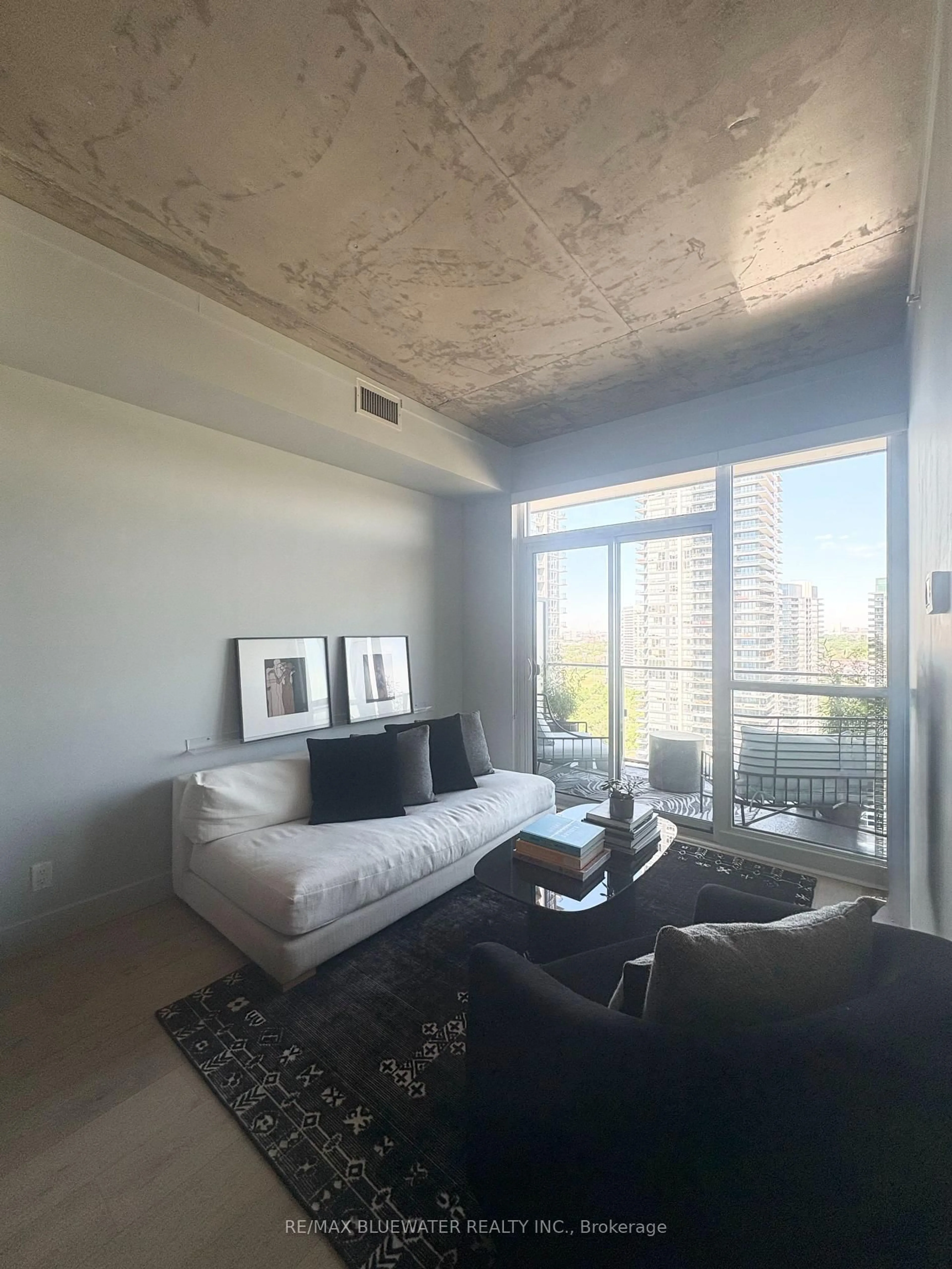 Living room with furniture, cement floor for 2200 Lake Shore Blvd #2806, Toronto Ontario M8V 1A4