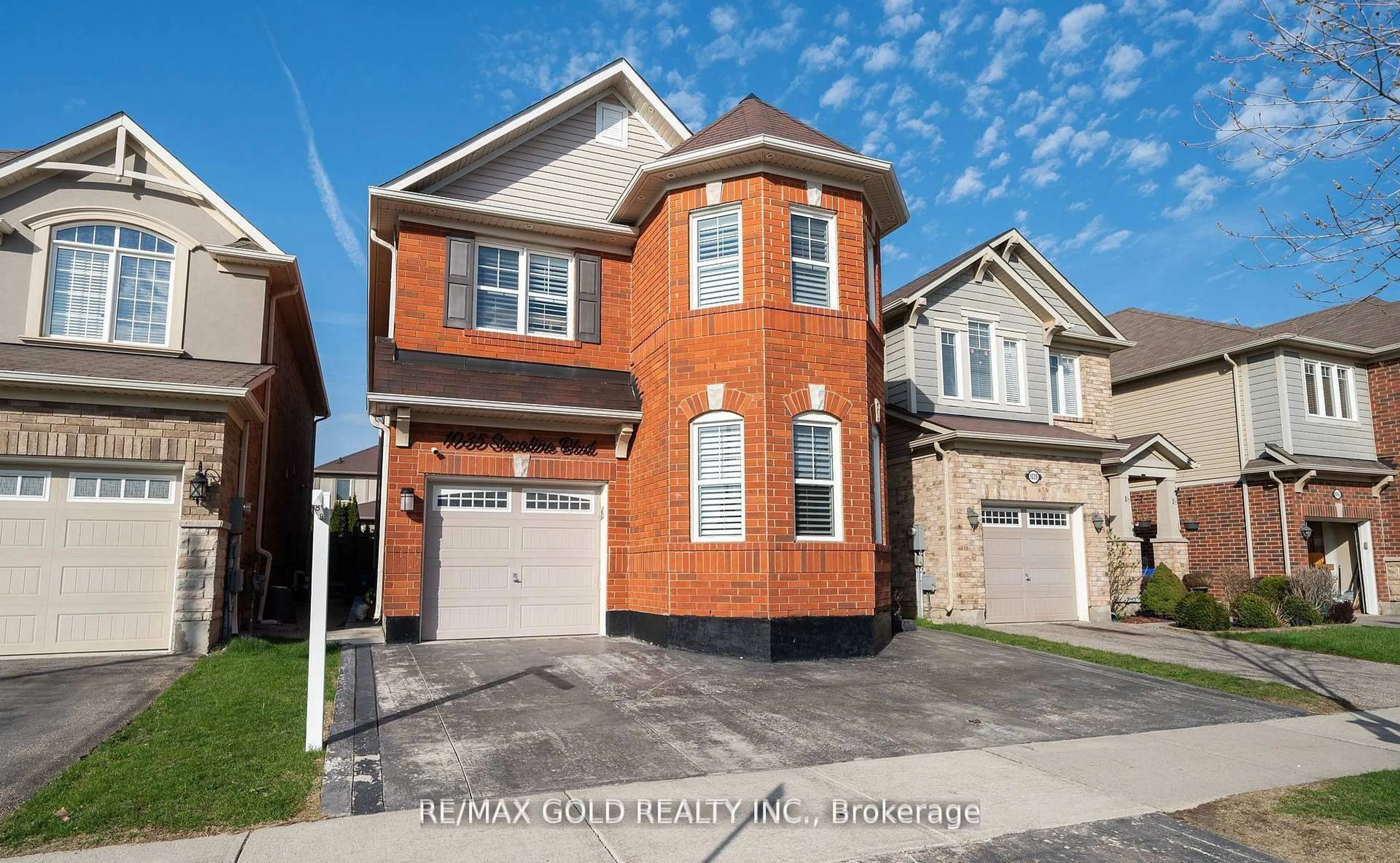 Home with brick exterior material, street for 1035 SAVOLINE Blvd, Milton Ontario L9T 8P2