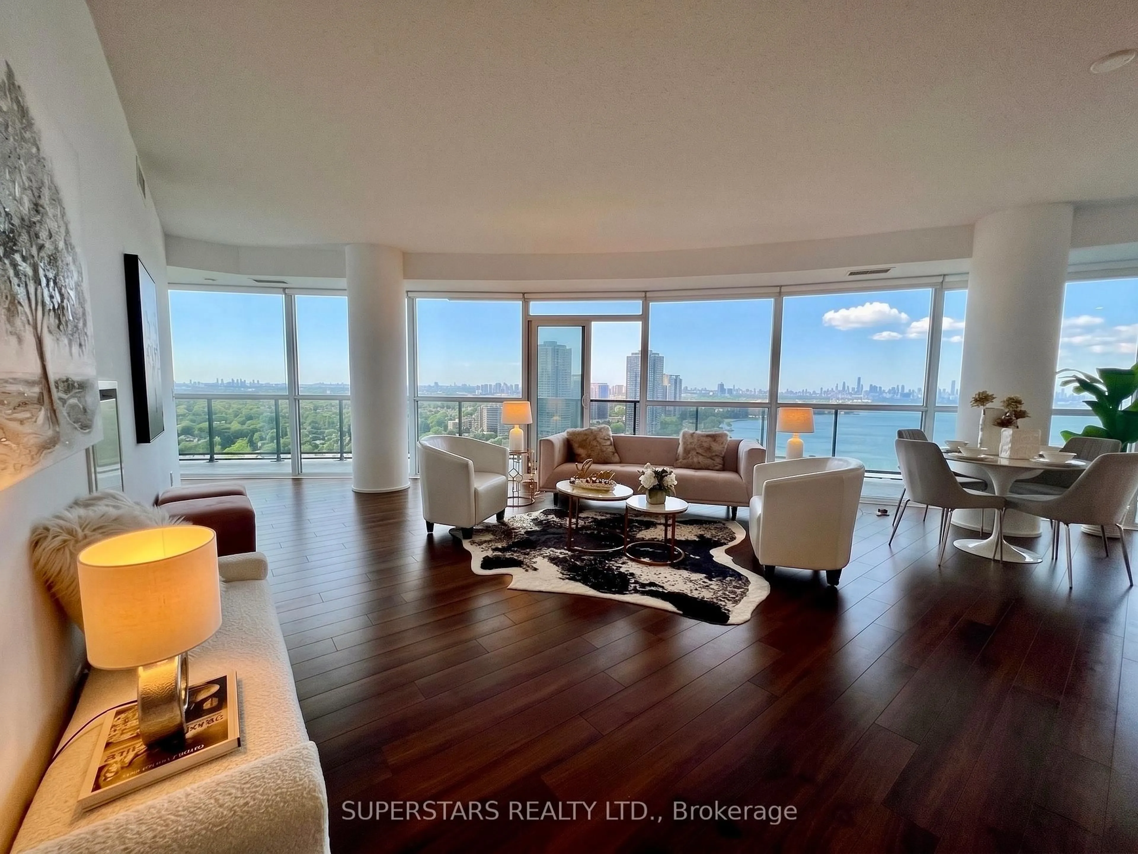 Living room with furniture, wood/laminate floor for 80 Marine Parade Dr #2302, Toronto Ontario M8V 4B4